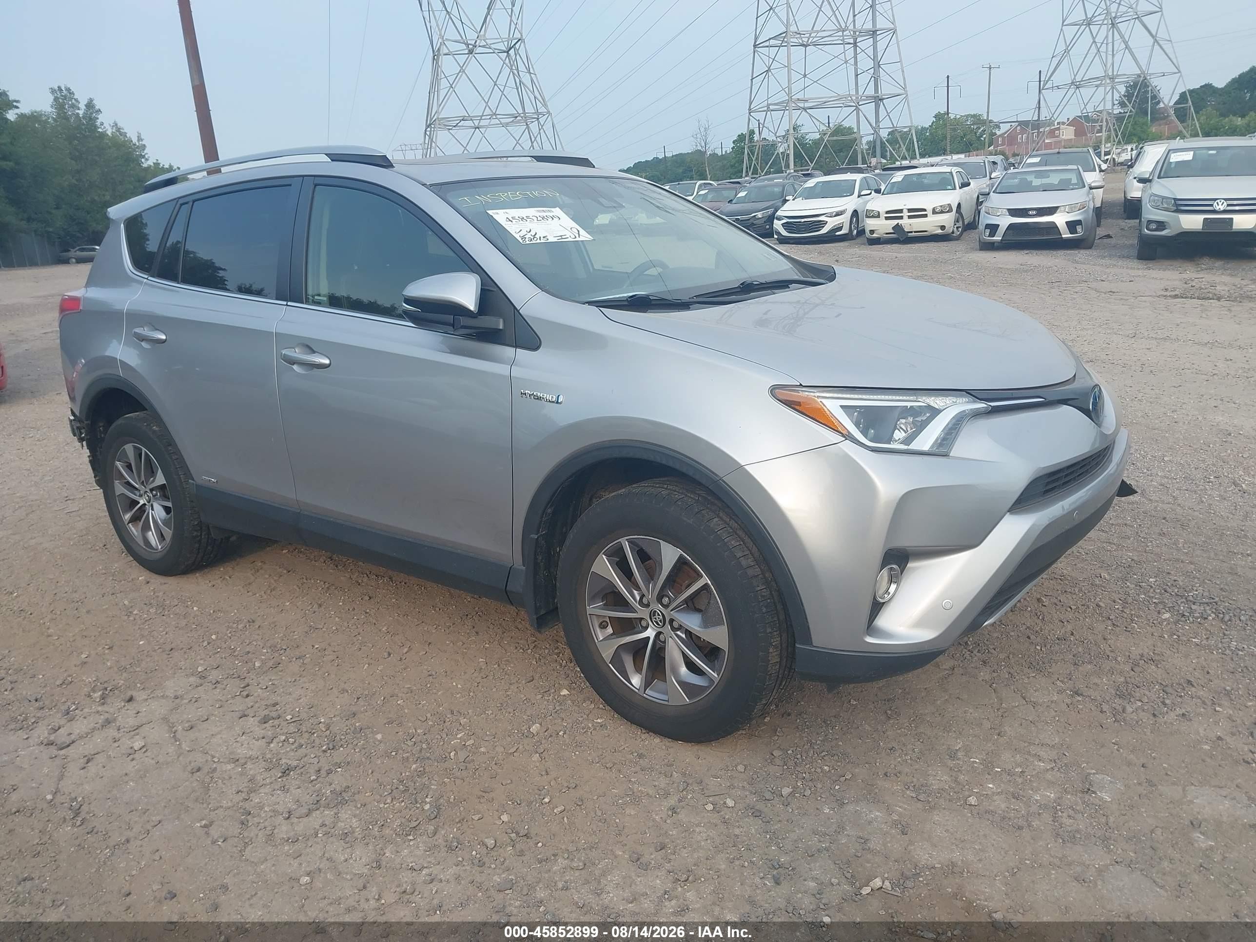 2018 Toyota RAV4 Hybrid VIN JTMRJREV0JD208645 — IAAI salvage auction photo