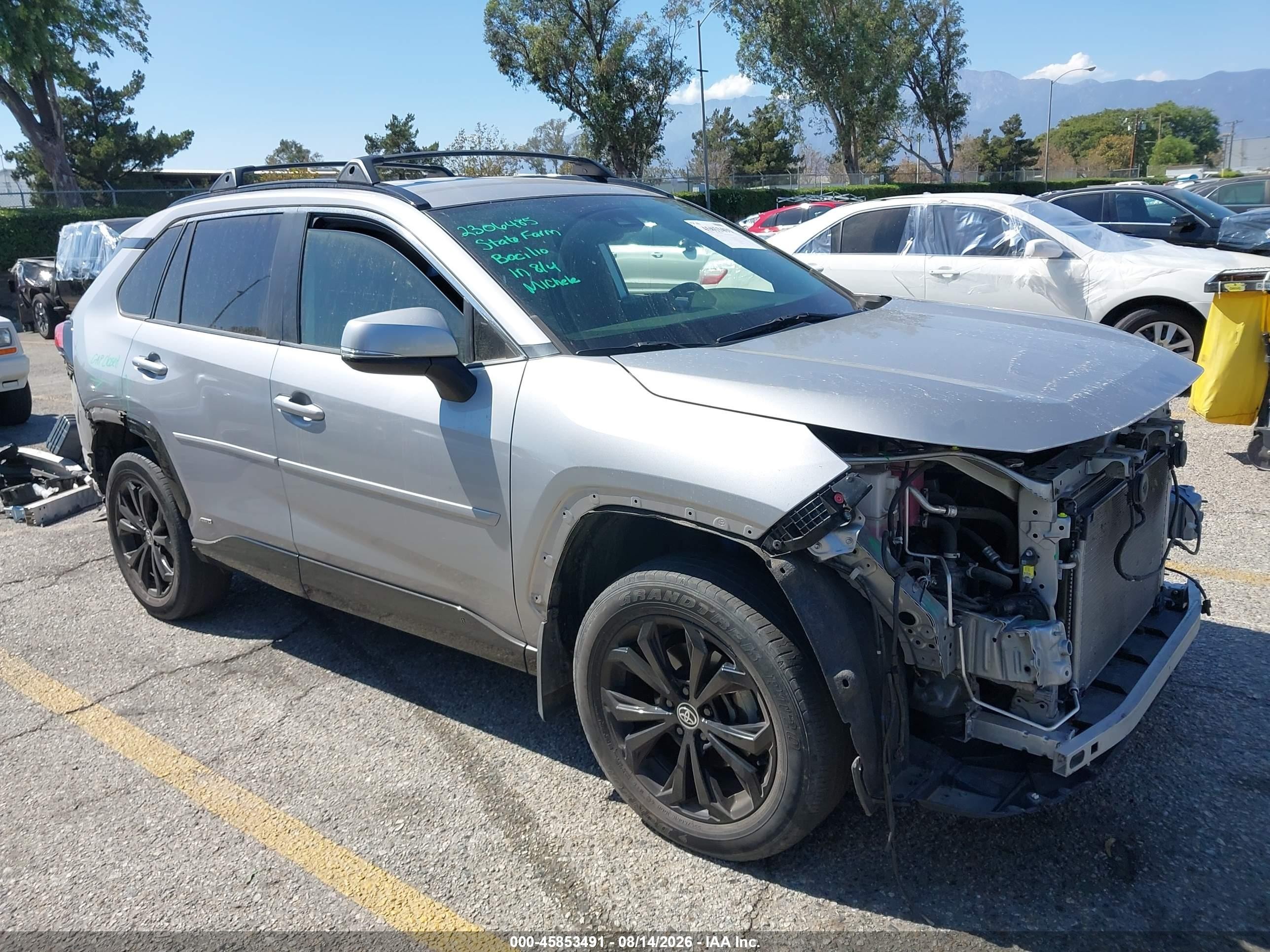 2022 Toyota RAV4 Hybrid VIN JTM16RFVXND058384 — IAAI salvage auction photo