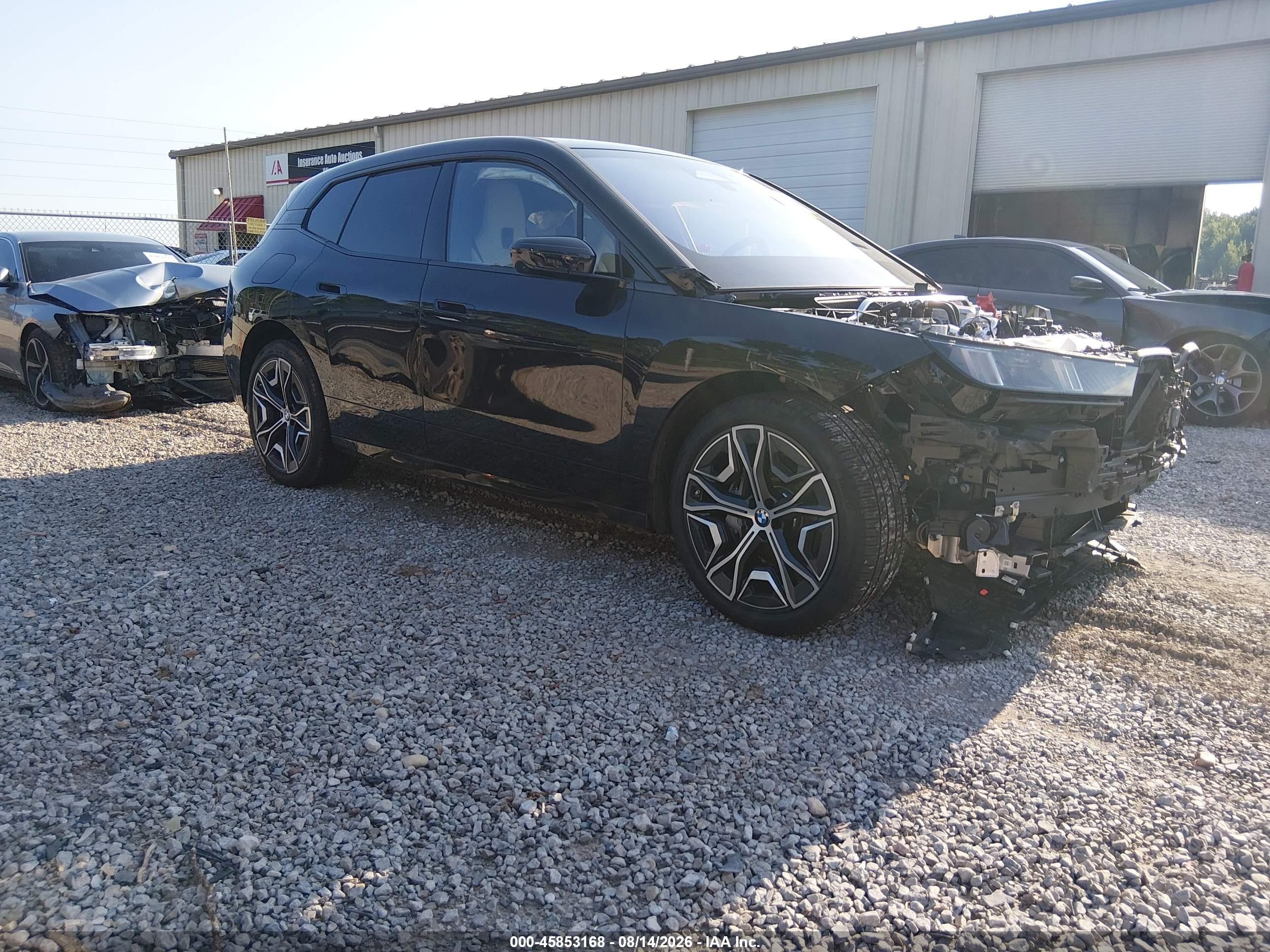 2026 BMW iX VIN WB543CF0XTCX23032 — IAAI salvage auction photo