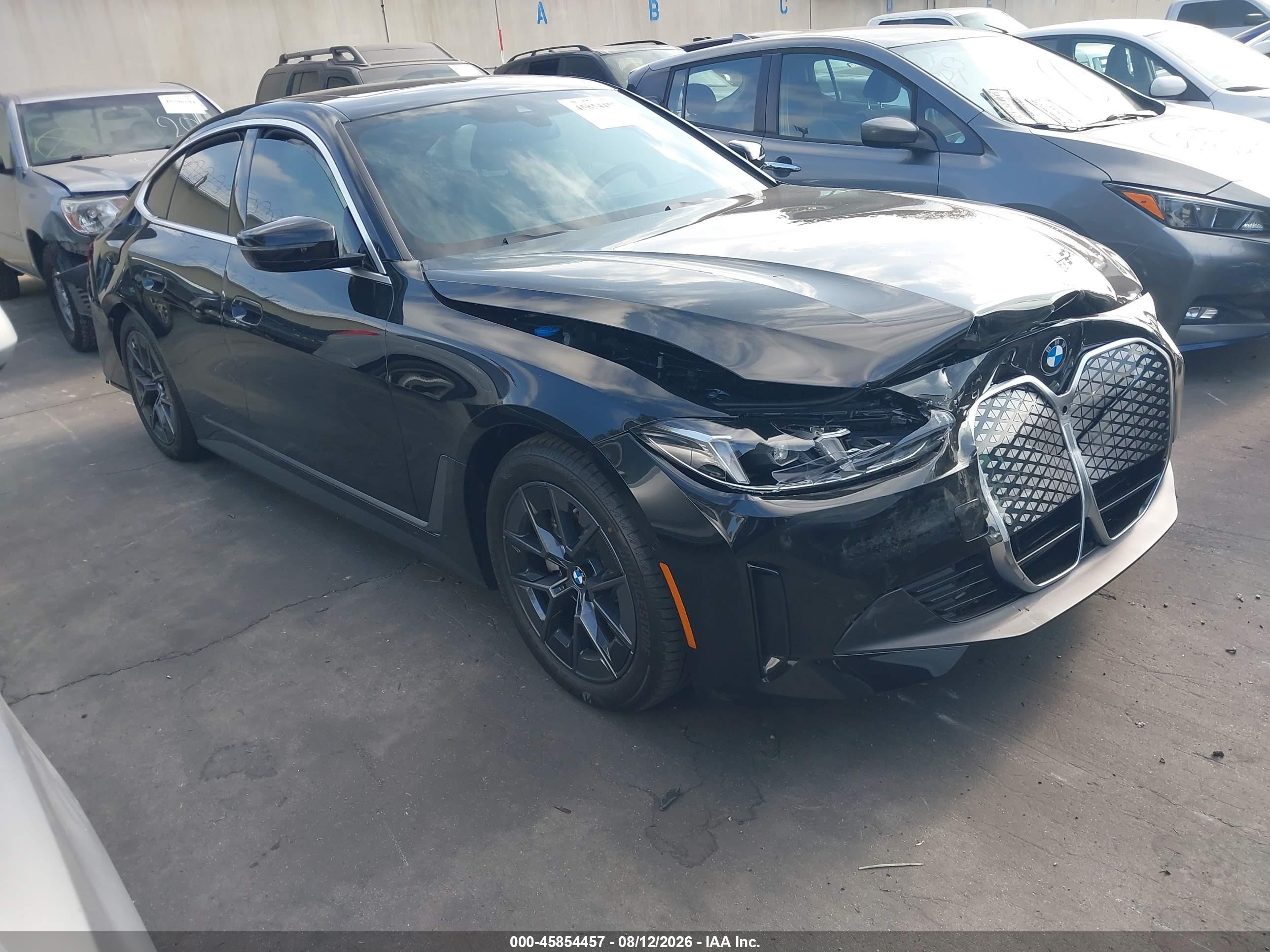 2026 BMW i4 VIN WBY63HD00TFW87362 — IAAI salvage auction photo