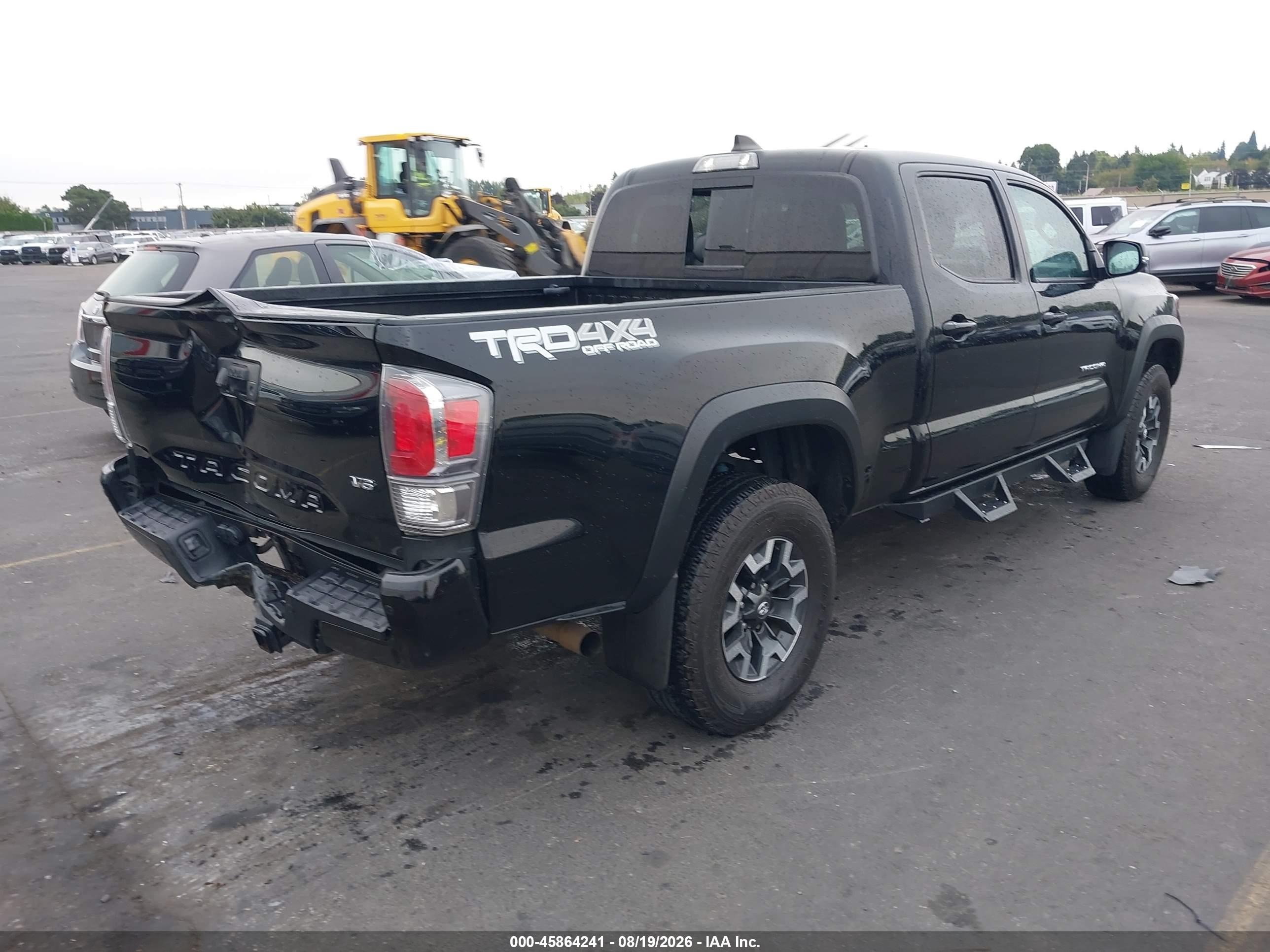 2021 Toyota Tacoma VIN 3TMDZ5BN3MM120049 IAAI salvage auction — Rear End, Salvage (Oregon), sold $22,400 on 2026-09-24 (photo 4)