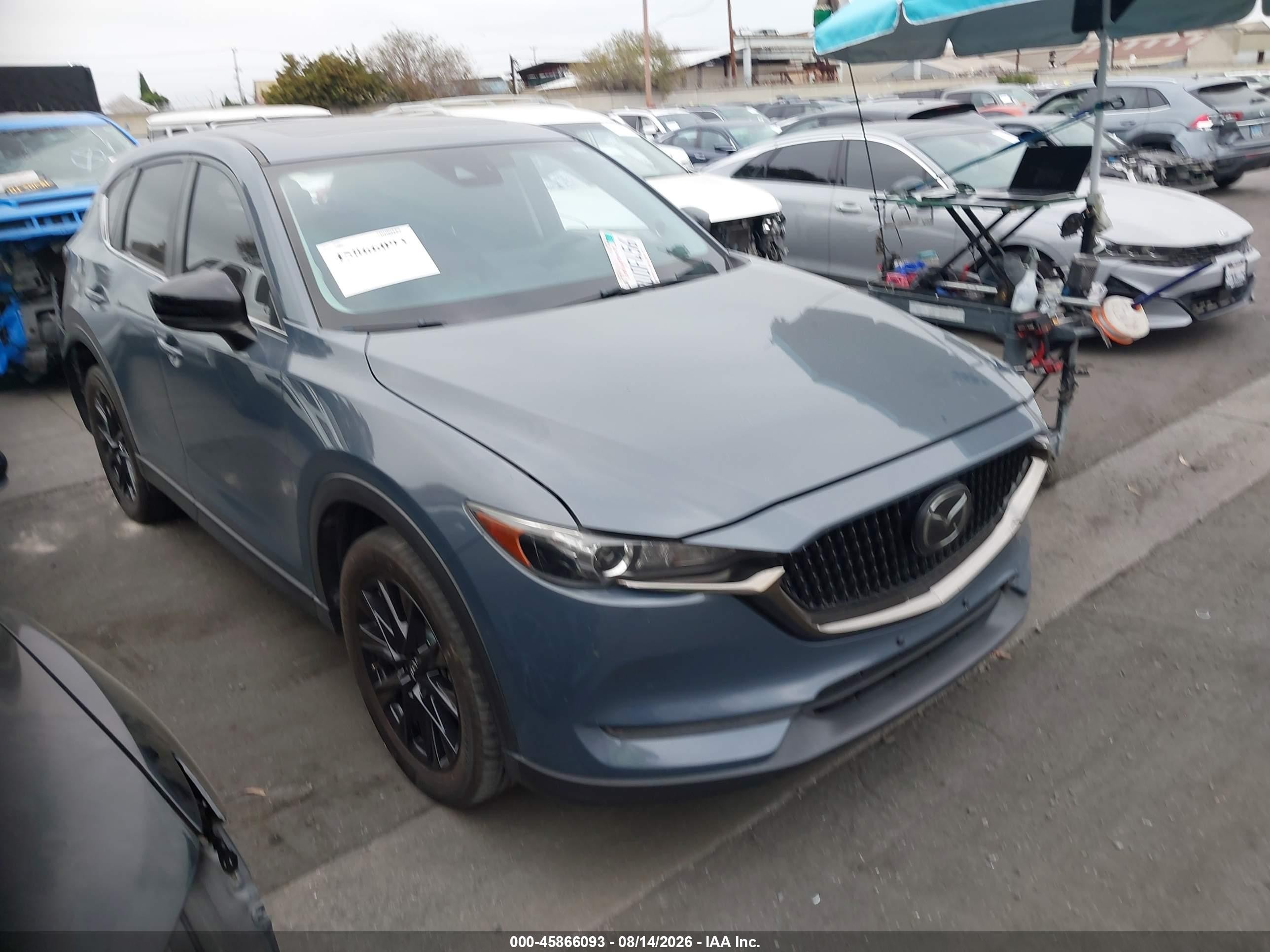 2021 Mazda CX-5 VIN JM3KFACY8M0353839 IAAI salvage auction — Rear End, Wait Title, sold $6,600 on 2026-09-21 (photo 1)