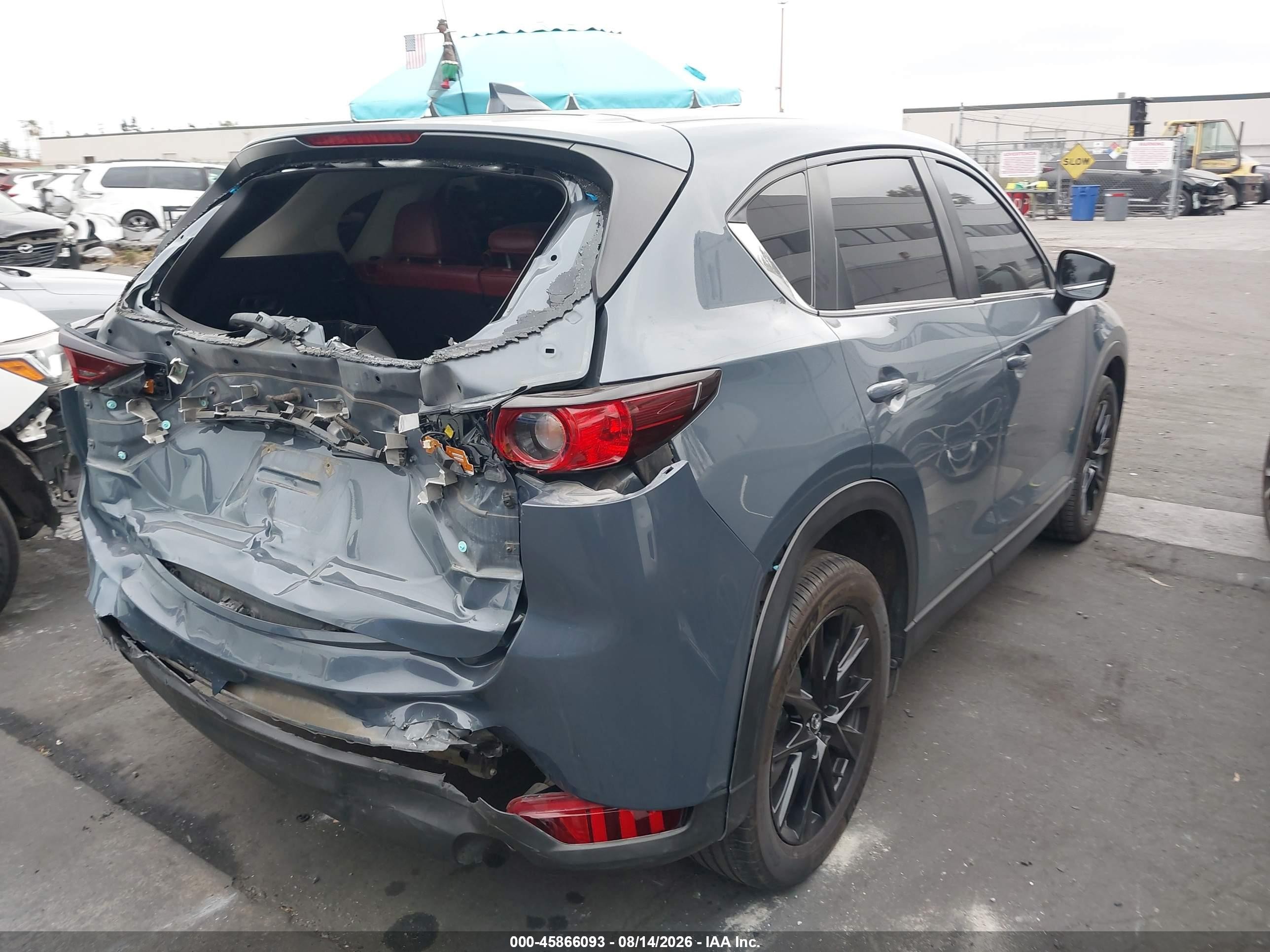 2021 Mazda CX-5 VIN JM3KFACY8M0353839 IAAI salvage auction — Rear End, Wait Title, sold $6,600 on 2026-09-21 (photo 4)