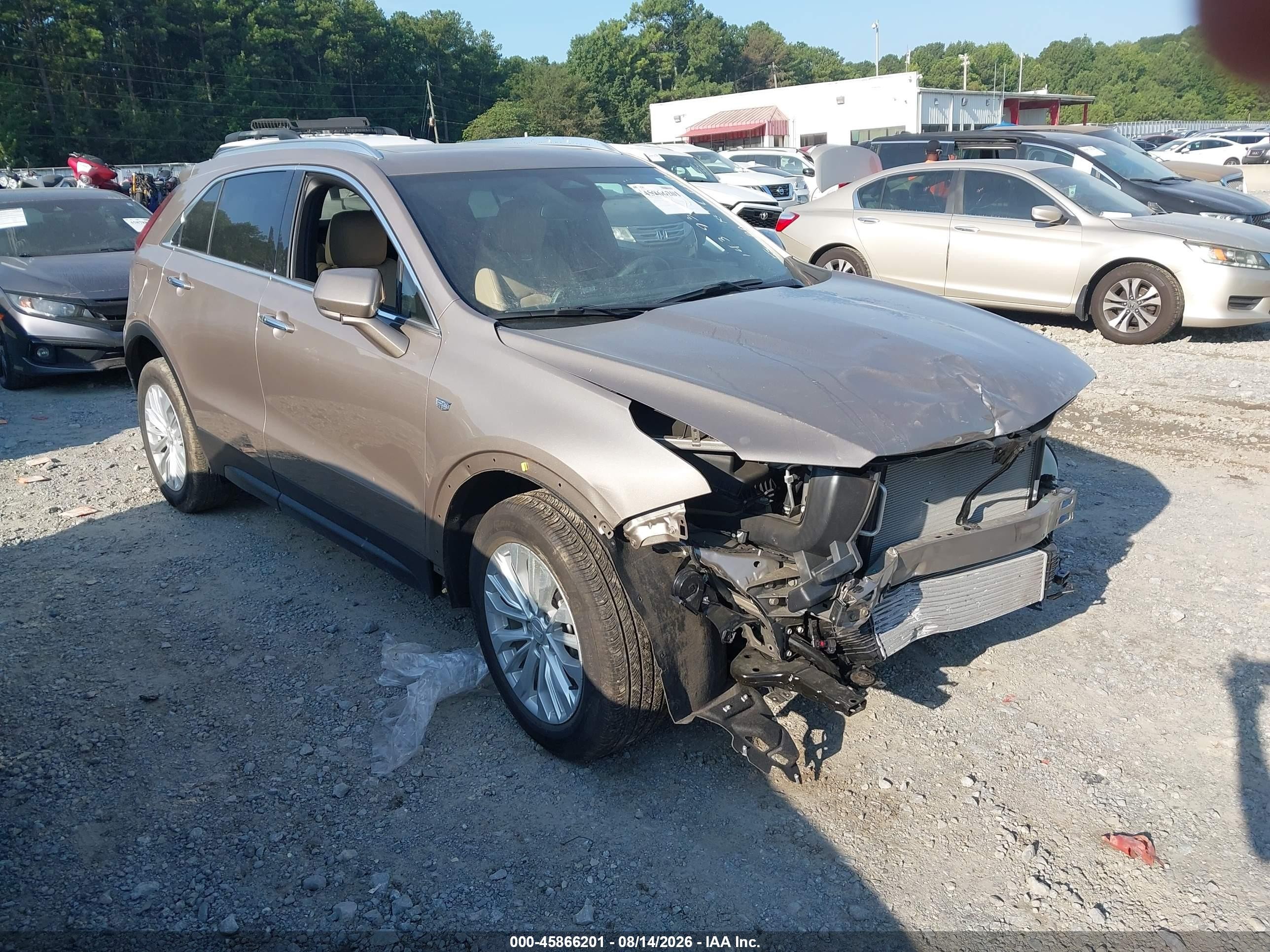 2024 Cadillac XT4 VIN 1GYAZAR40RF143931 — IAAI salvage auction photo
