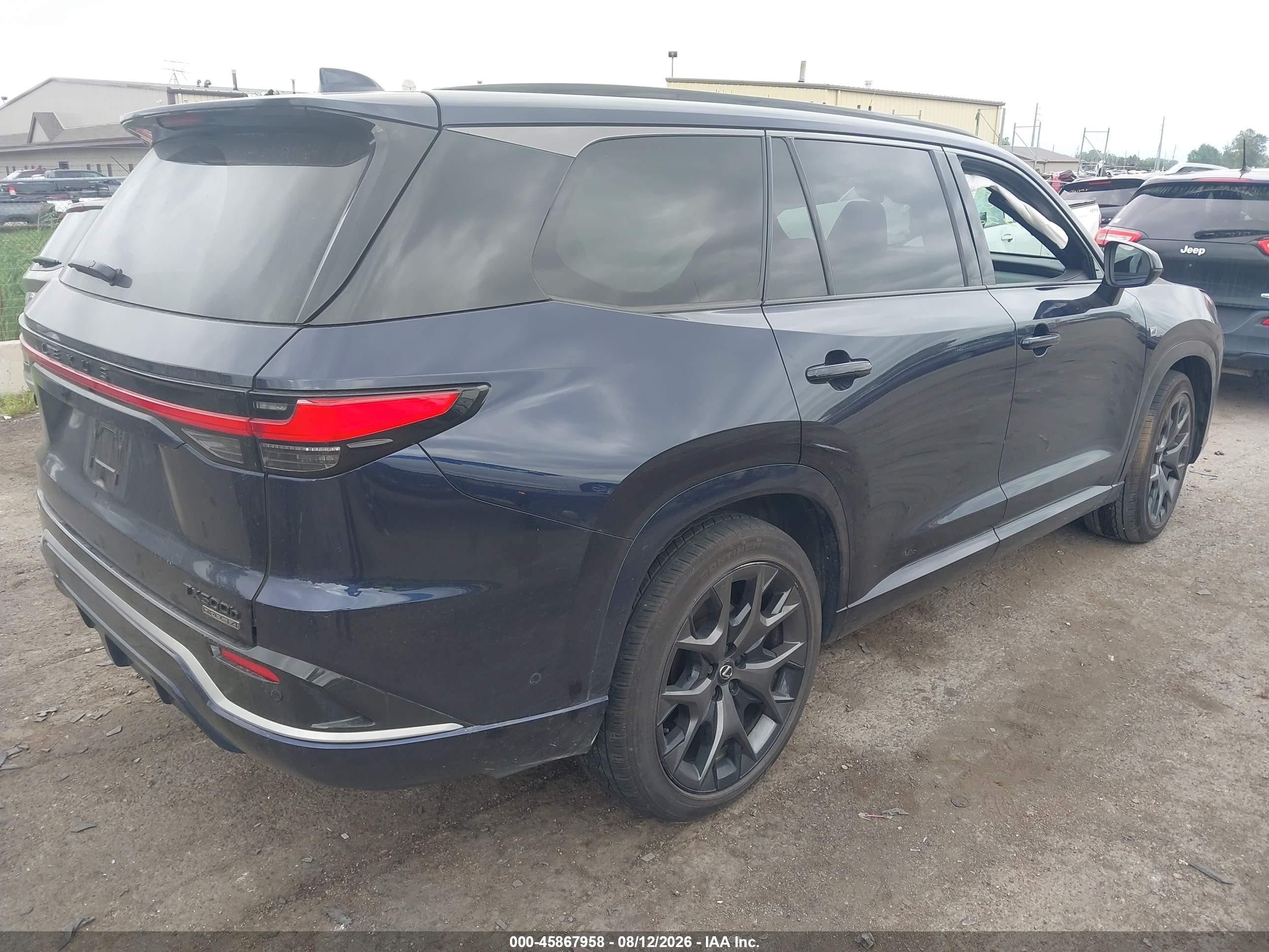 2025 Lexus TX 500h VIN 5TDABAB69SS011228 IAAI salvage auction — Side, Clear (Michigan), sold $30,750 on 2026-09-16 (photo 4)