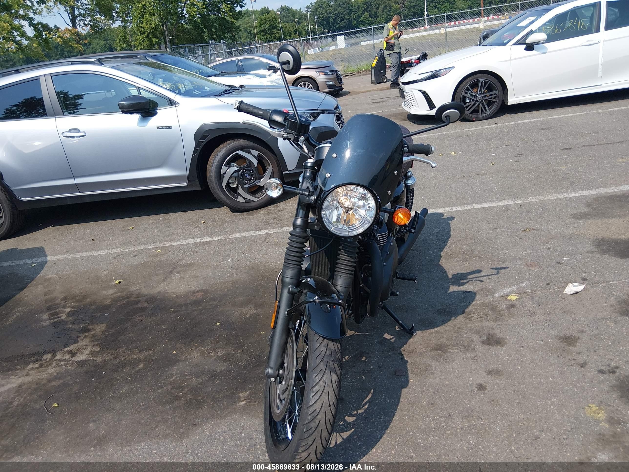 2023 Triumph Motorcycle BONNEVILLE VIN SMTD40HL9PTBJ7402 IAAI salvage auction — Side, Salvage (New Jersey), sold $3,850 on 2026-09-16 (photo 5)