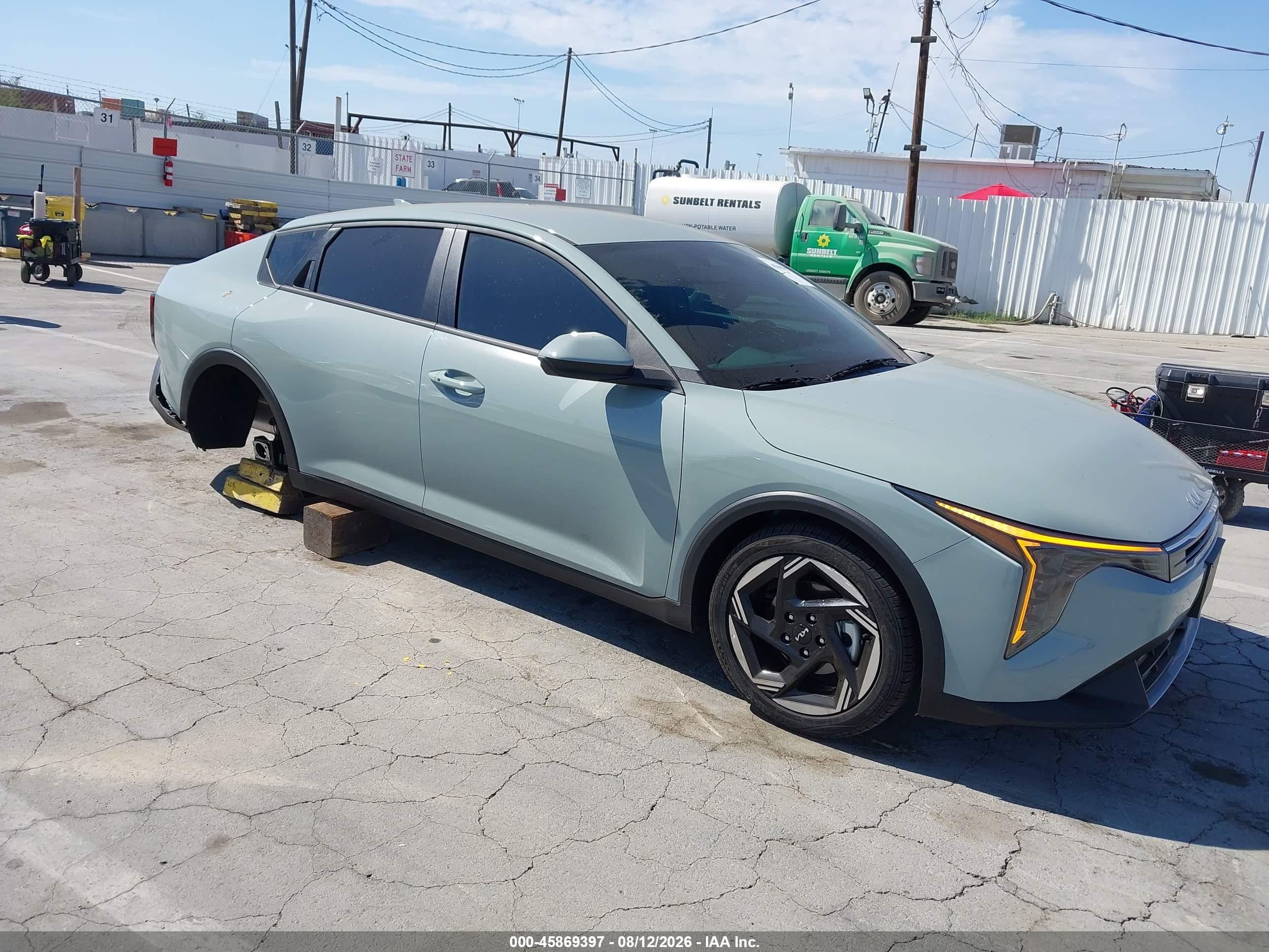 2026 Kia K4 VIN 3KPFU4DE1TE343553 IAAI salvage auction — Side, Salvage (California), sold $7,100 on 2026-09-13 (photo 1)