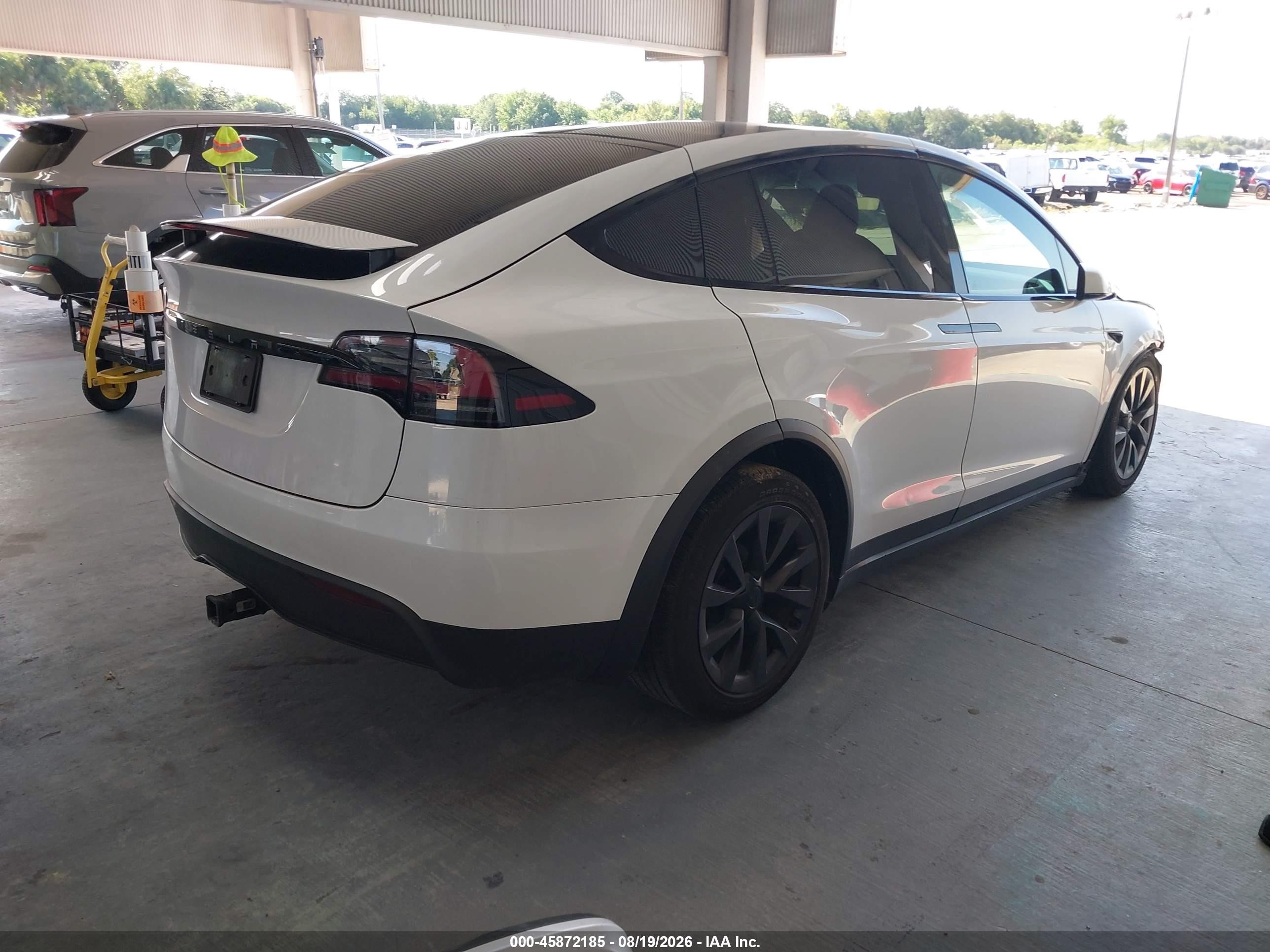 2023 Tesla Model x VIN 7SAXCDE56PF421334 IAAI salvage auction — Front End, Rebuildable (Florida), sold $18,200 on 2026-09-23 (photo 4)