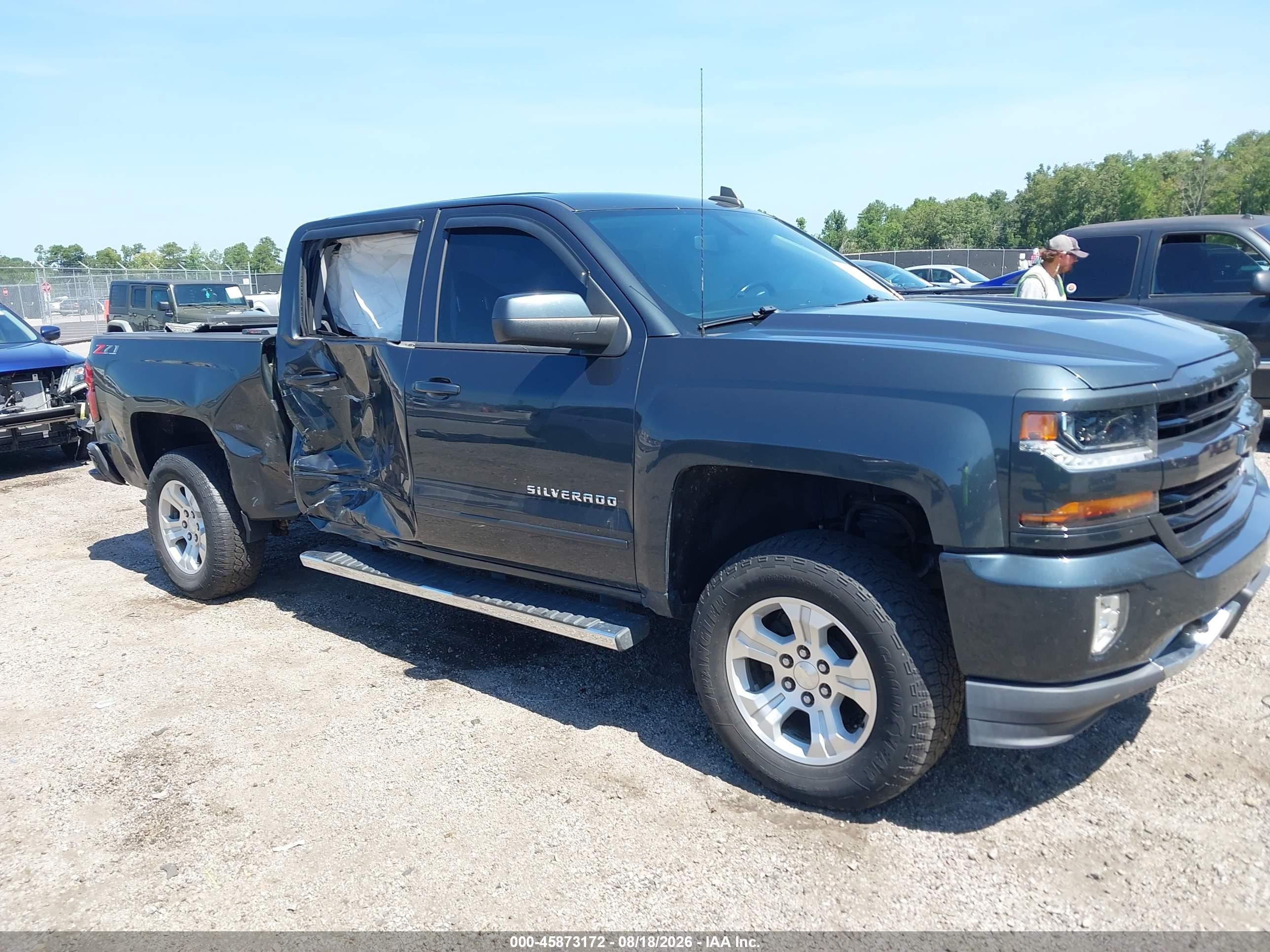 2018 Chevrolet Silverado 1500 VIN 3GCUKREC5JG360168 — IAAI salvage auction photo