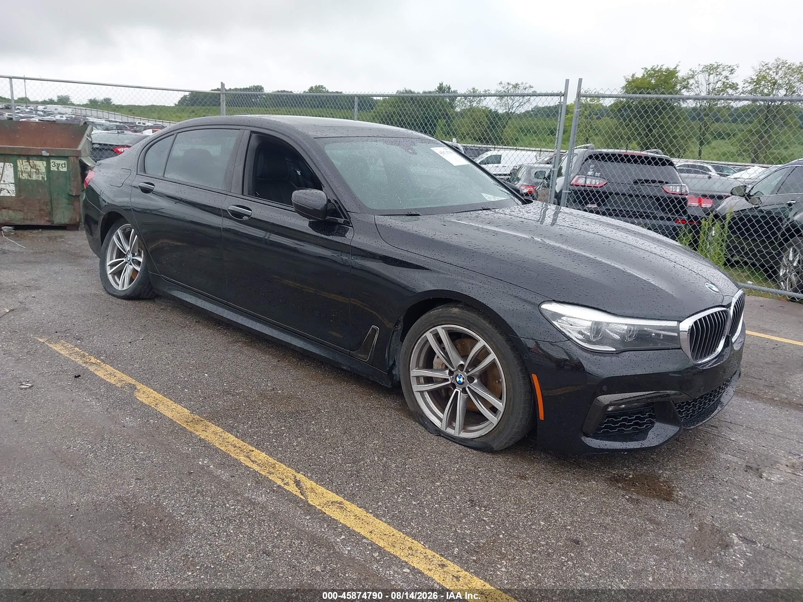 2018 BMW 7 Series VIN WBA7E4C55JGV24023 — IAAI salvage auction photo