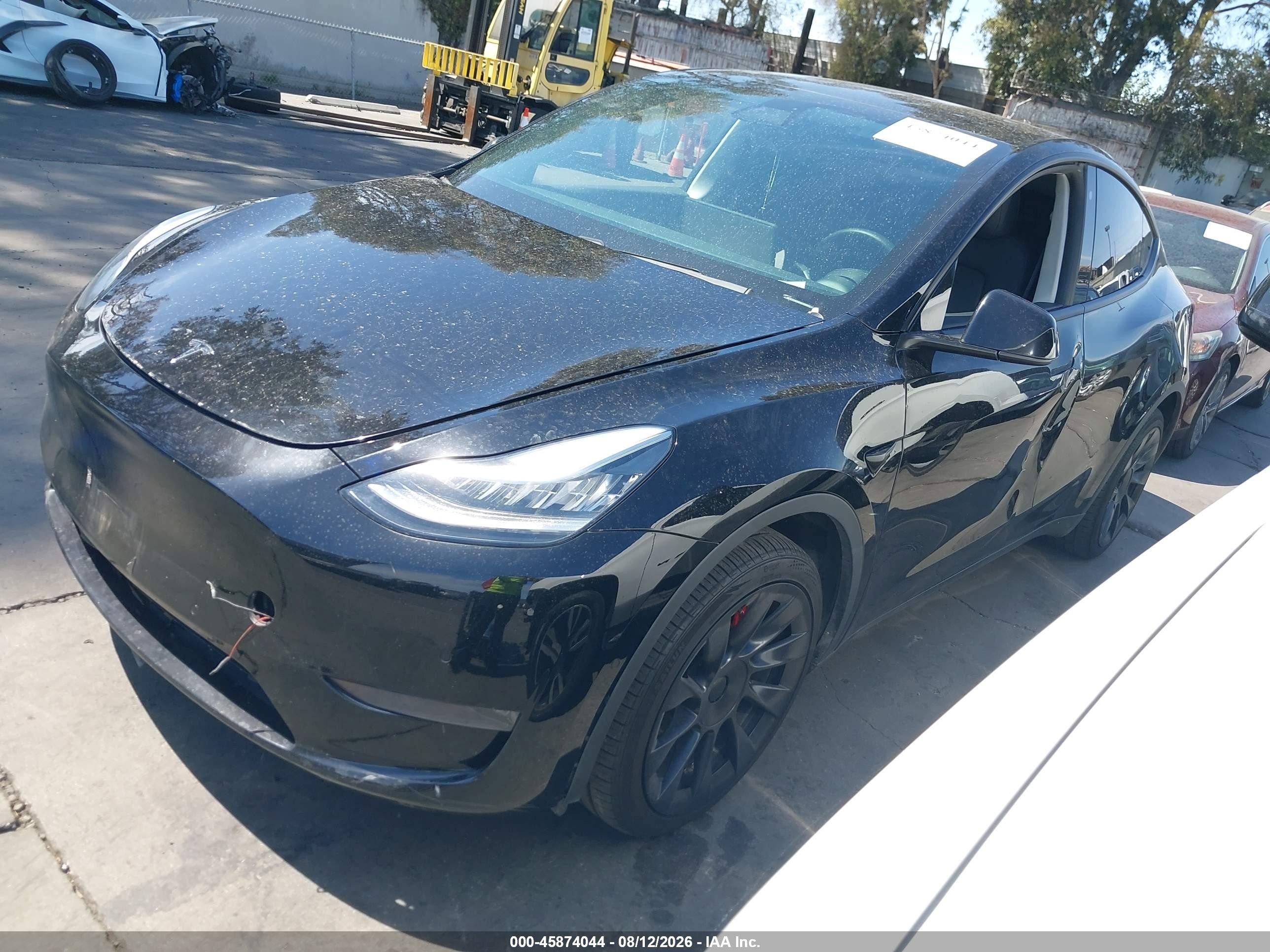 2020 Tesla Model Y VIN 5YJYGDEE4LF038976 IAAI salvage auction — Side, Salvage Certificate (California), sold $8,500 on 2026-09-12 (photo 2)