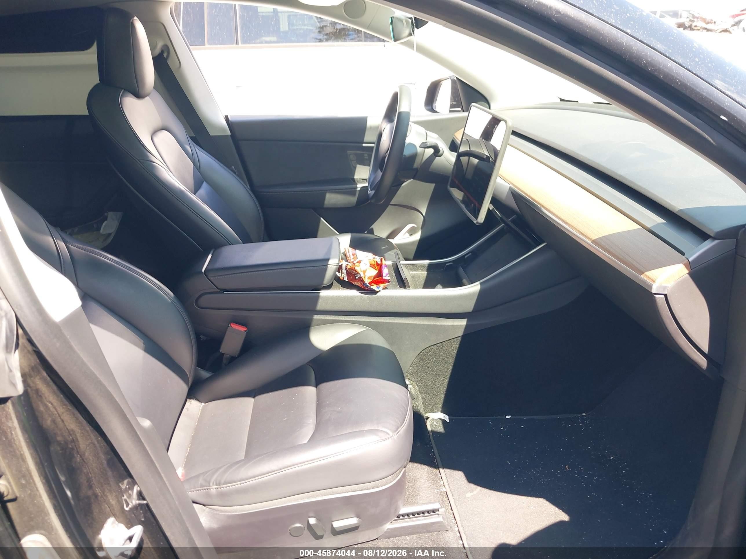 2020 Tesla Model Y VIN 5YJYGDEE4LF038976 IAAI salvage auction — Side, Salvage Certificate (California), sold $8,500 on 2026-09-12 (photo 5)
