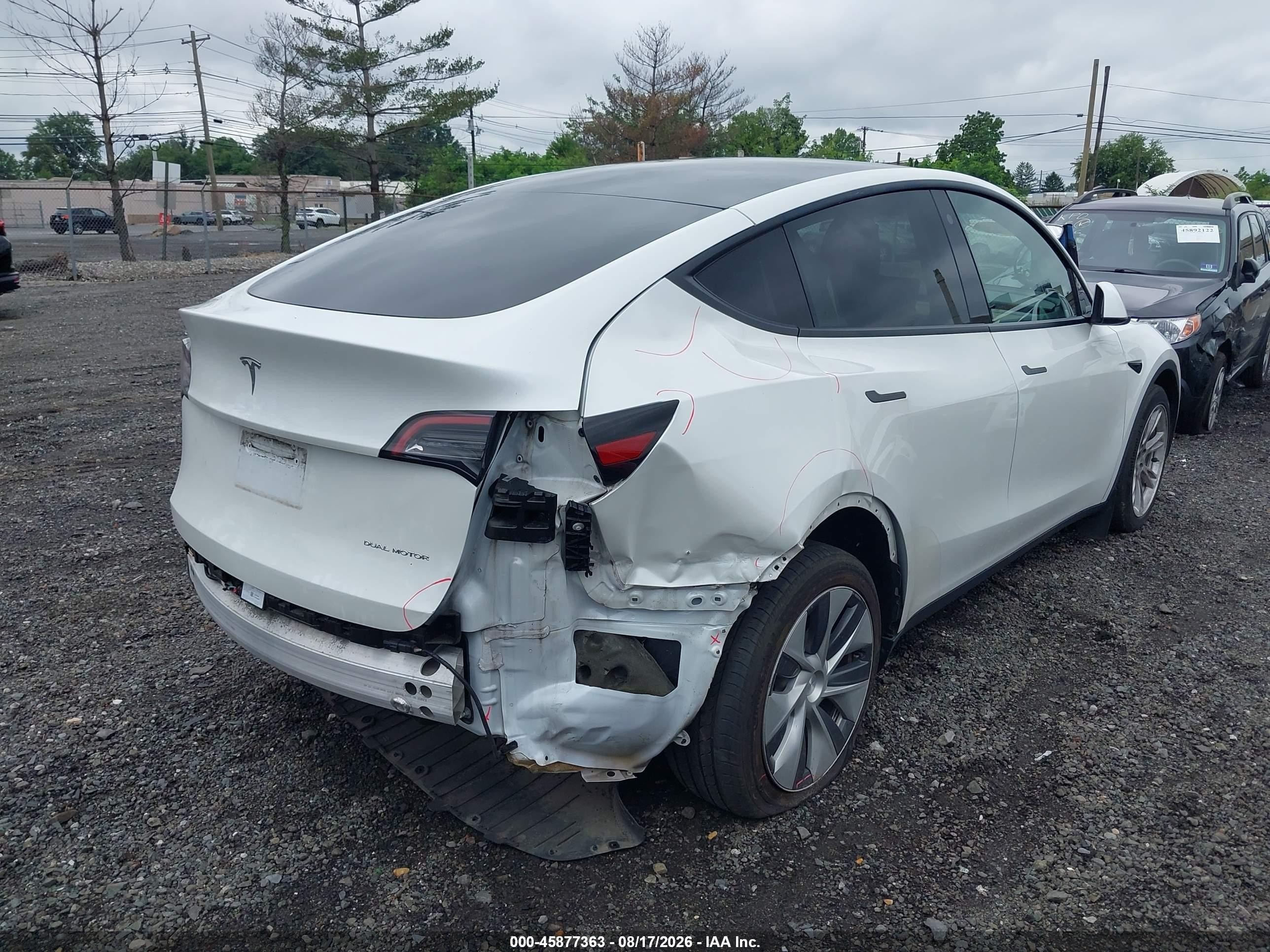 2023 Tesla Model Y VIN 7SAYGDEE1PF771172 IAAI salvage auction — Rear End, Salvage (New Jersey), sold $11,900 on 2026-09-10 (photo 6)