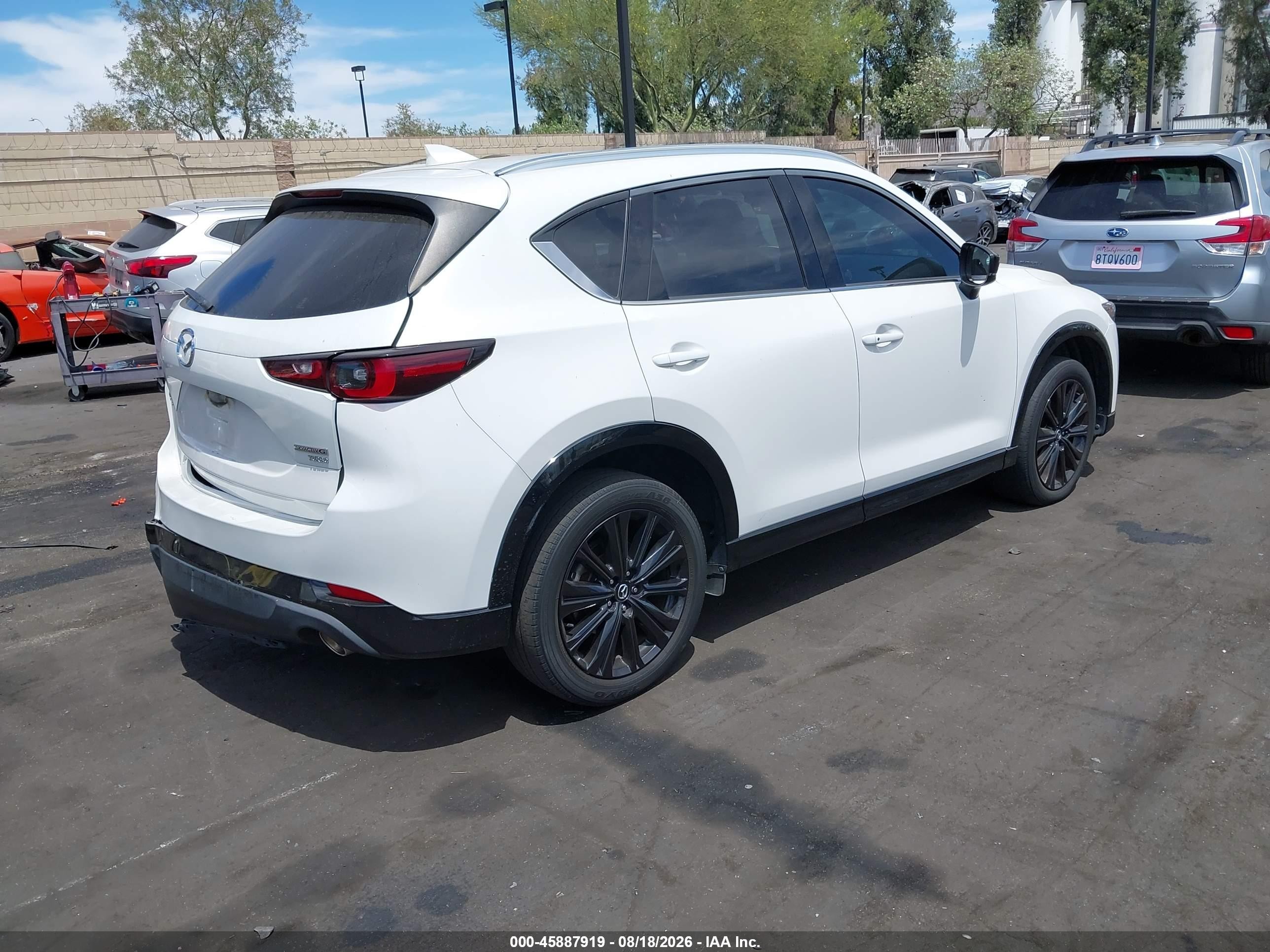 2023 Mazda Cx-5 VIN JM3KFBAY6P0124301 IAAI salvage auction — Rear End, Salvage Certificate (California), sold $7,900 on 2026-09-13 (photo 4)