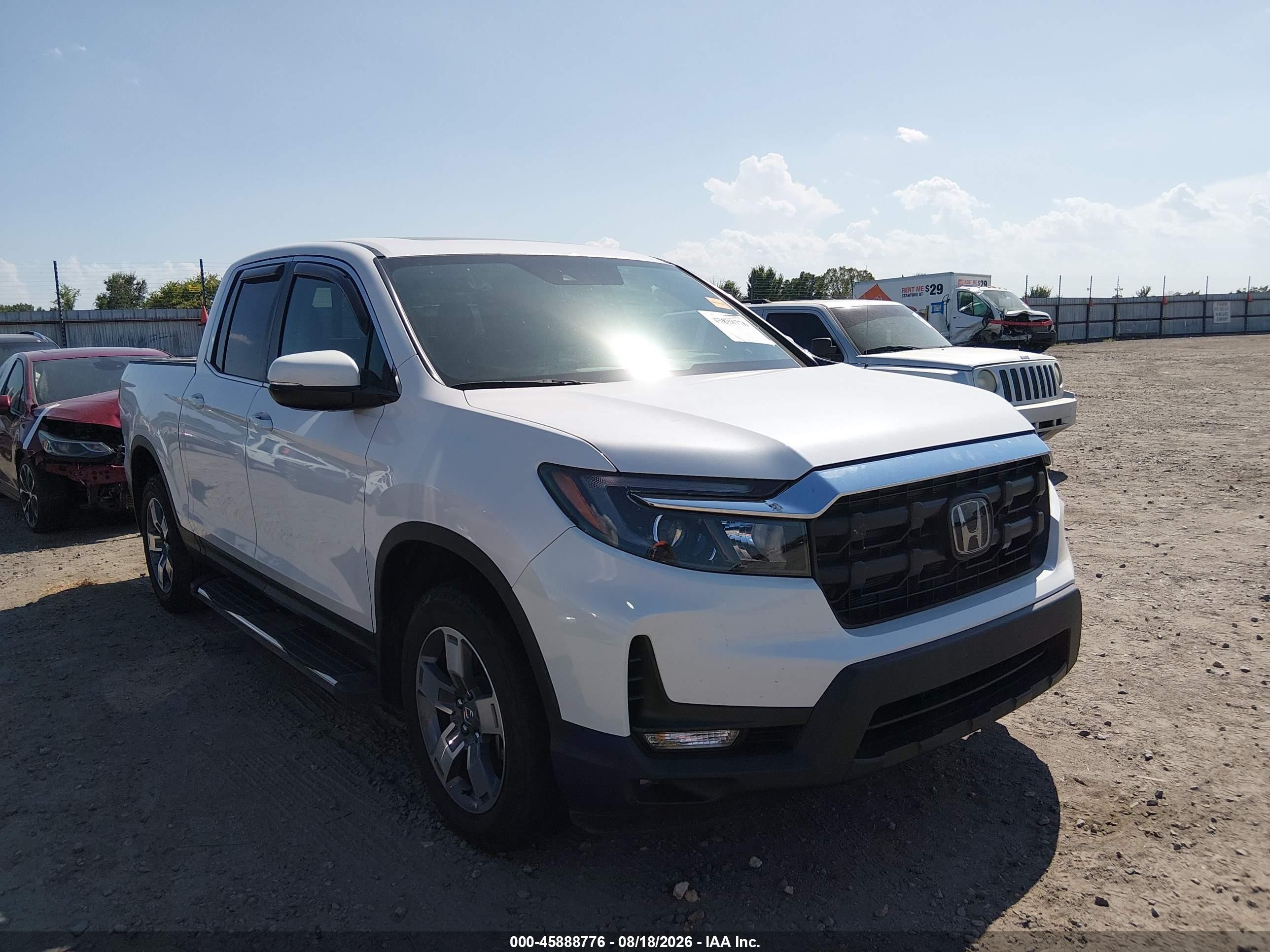 2024 Honda Ridgeline VIN 5FPYK3F53RB025899 — IAAI salvage auction photo