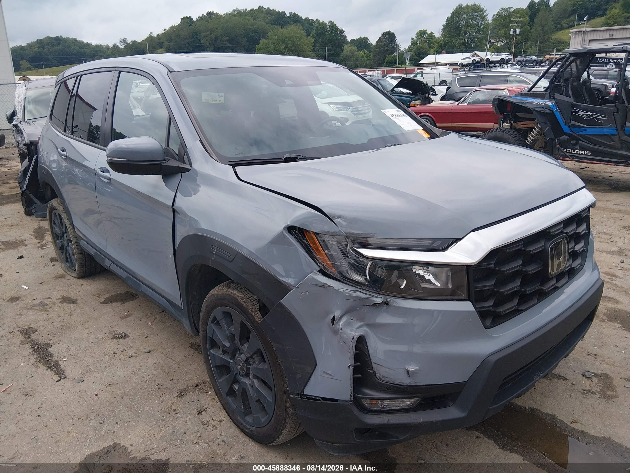 2023 Honda Passport VIN 5FNYF8H56PB010916 — IAAI salvage auction photo