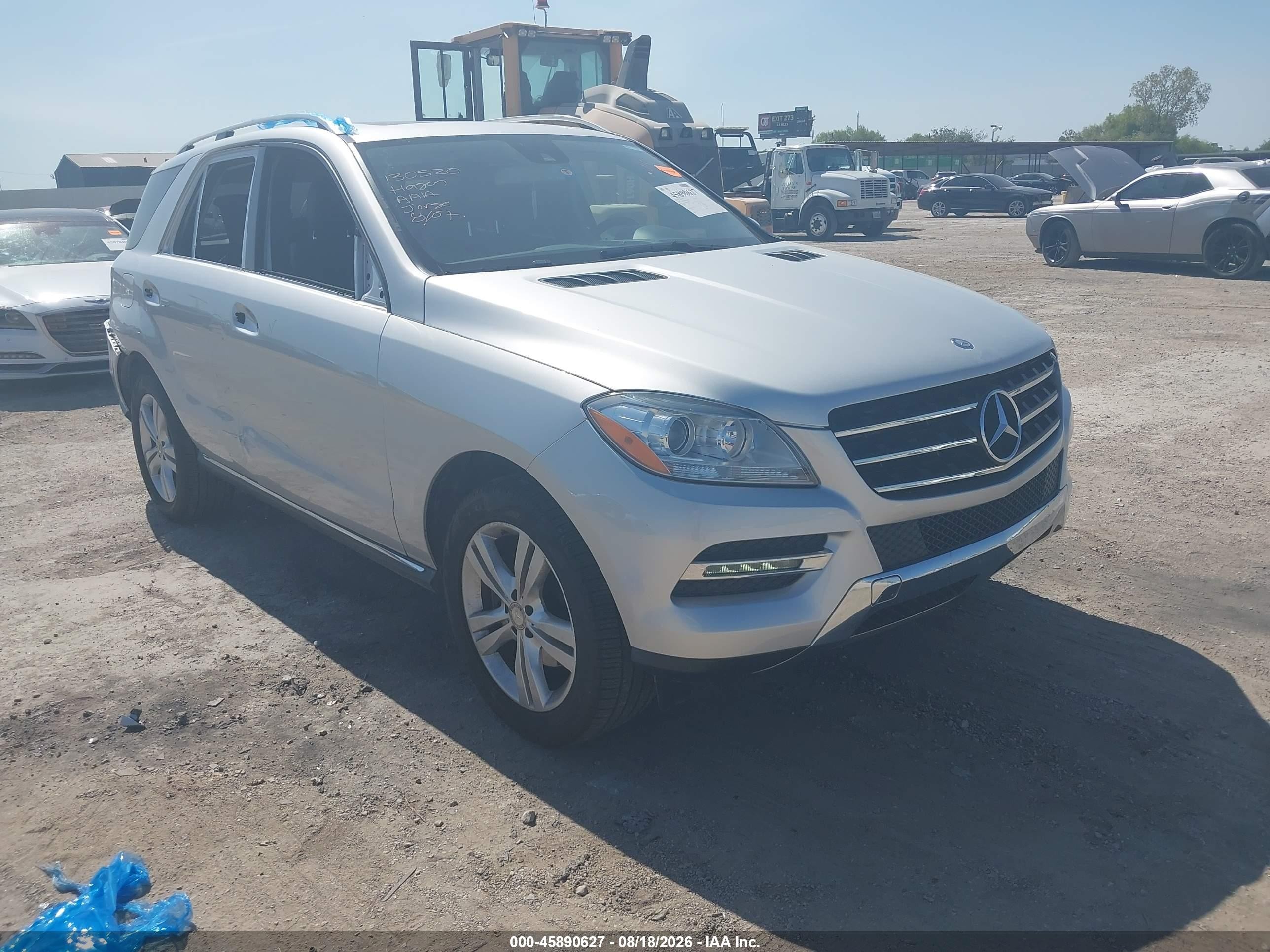 2015 Mercedes-Benz ML-Class VIN 4JGDA5JBXFA590279 — IAAI salvage auction photo