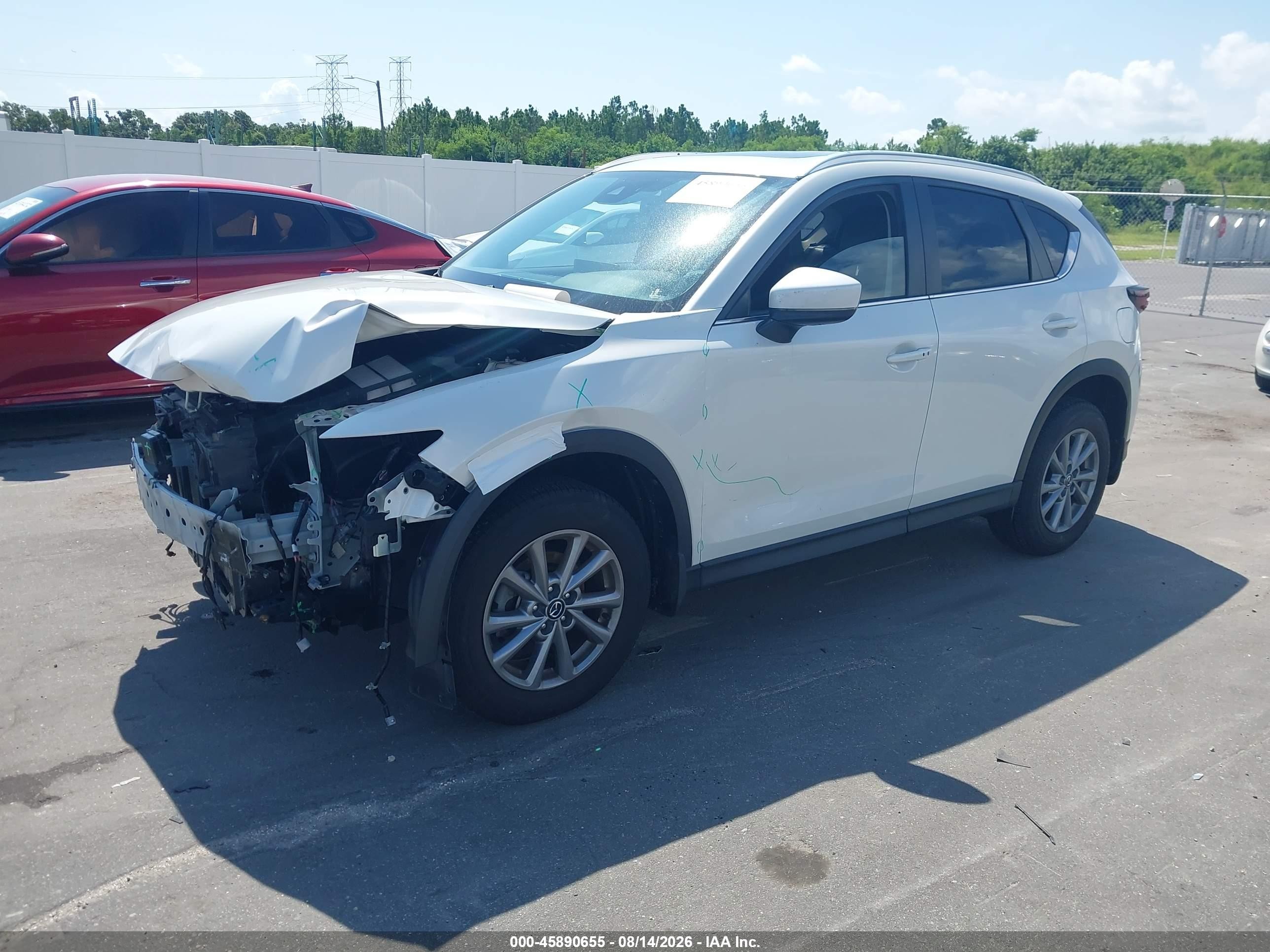 2023 Mazda Cx-5 VIN JM3KFBCM2P0194663 IAAI salvage auction — Front End, Rebuildable (Florida), sold $5,500 on 2026-09-04 (photo 2)