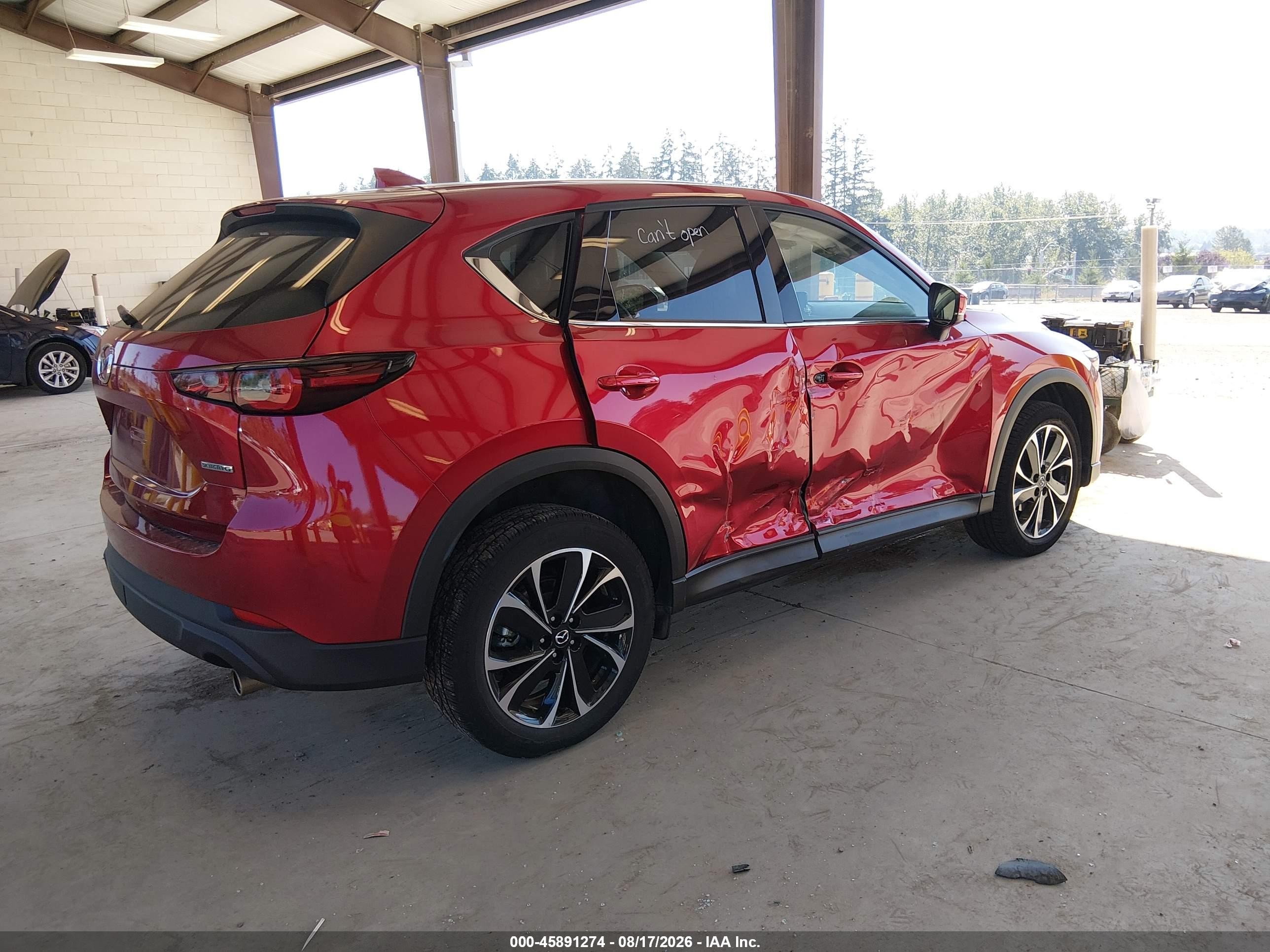 2023 Mazda Cx-5 VIN JM3KFBEM8P0130625 IAAI salvage auction — Side, Bill Of Sale (Washington), sold $7,100 on 2026-09-04 (photo 4)