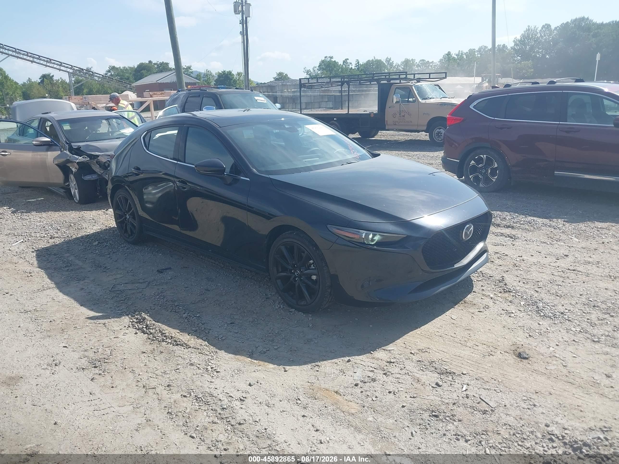 2021 Mazda 3 VIN JM1BPBJY7M1322106 — IAAI salvage auction photo