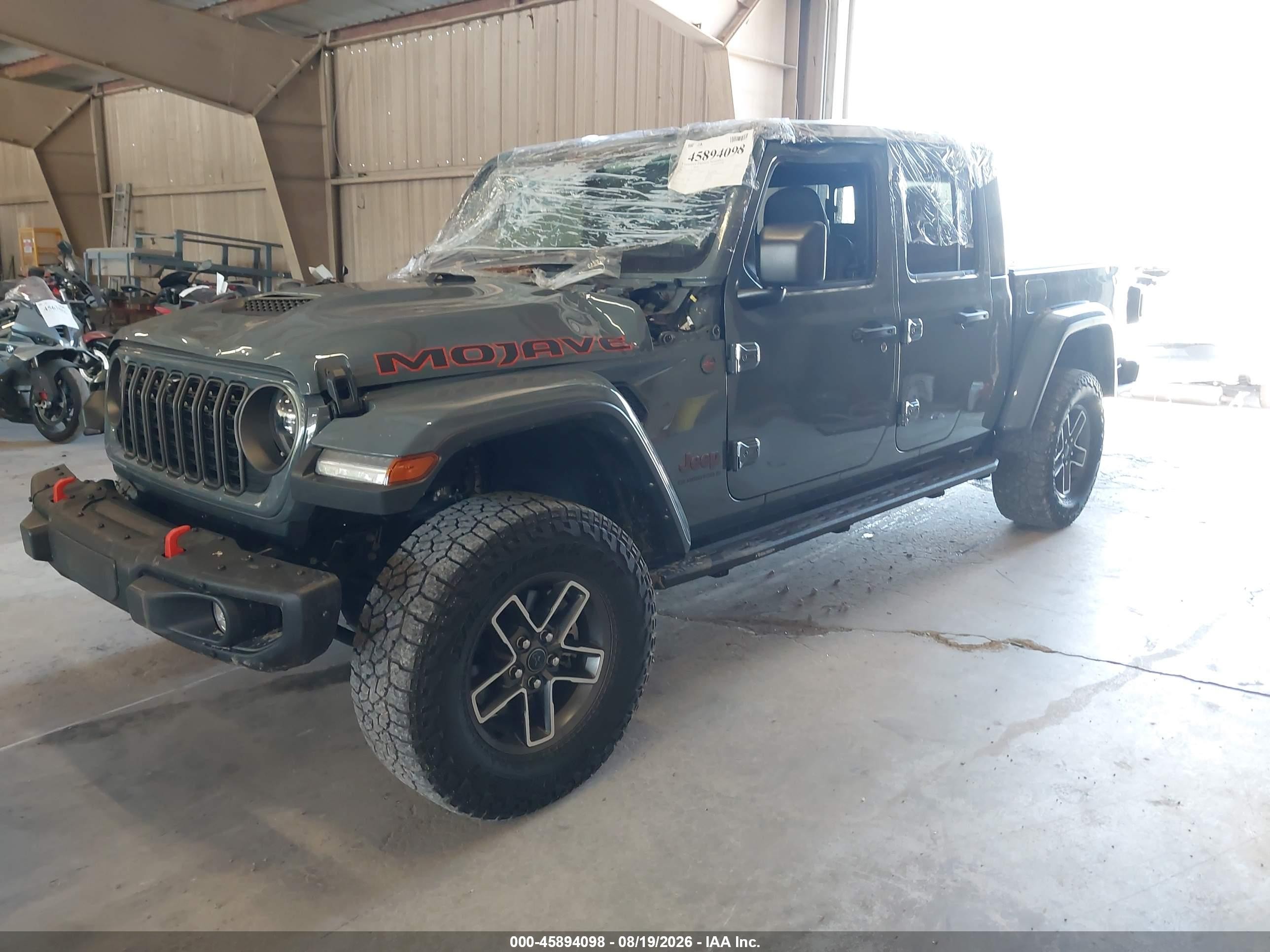 2024 Jeep Gladiator VIN 1C6JJTEG5RL120310 IAAI salvage auction — All Over, Salvage (Tennessee), sold $18,750 on 2026-10-03 (photo 2)
