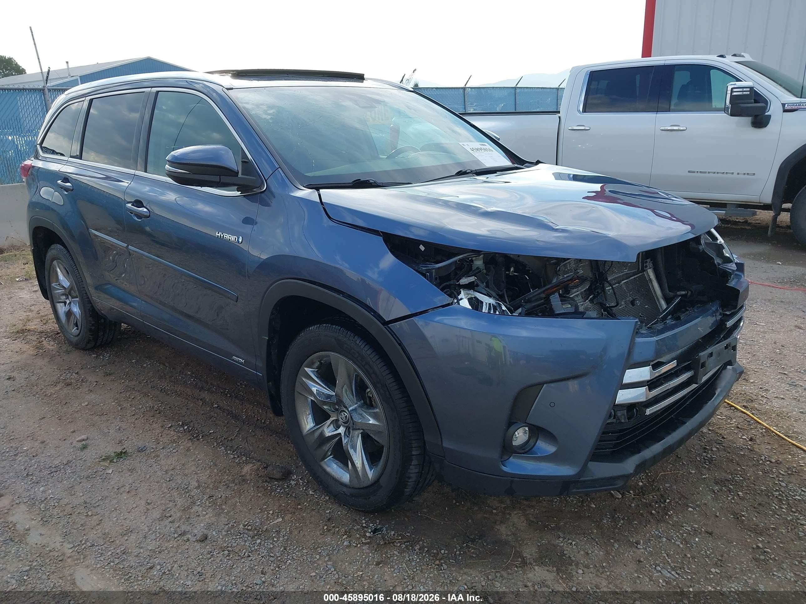 2019 Toyota Highlander Hybrid VIN 5TDDGRFHXKS069664 — IAAI salvage auction photo