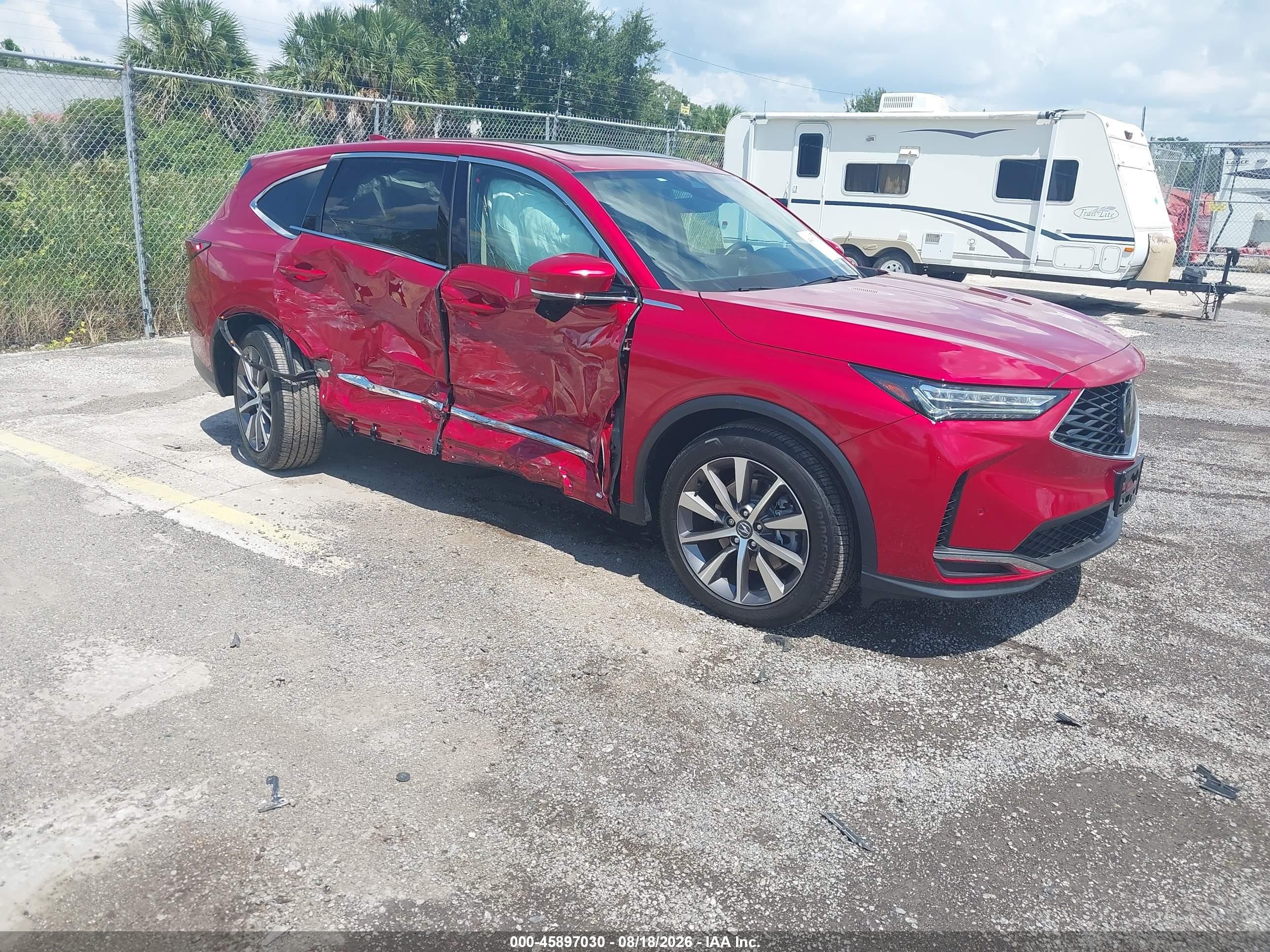 2025 Acura MDX VIN 5J8YD9H40SL005219 IAAI salvage auction — Side, Rebuildable (Florida), sold $16,100 on 2026-09-19 (photo 1)