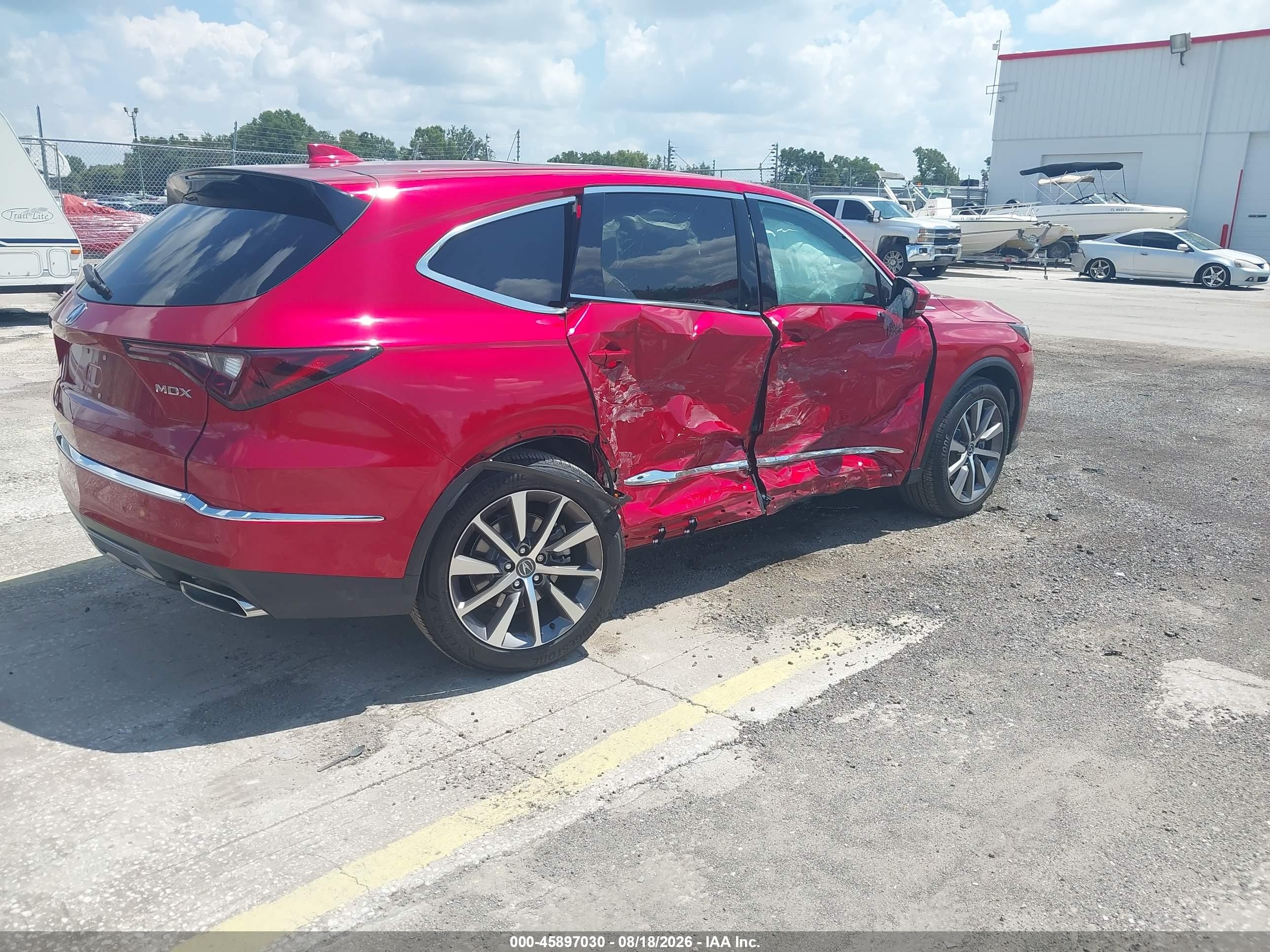 2025 Acura MDX VIN 5J8YD9H40SL005219 IAAI salvage auction — Side, Rebuildable (Florida), sold $16,100 on 2026-09-19 (photo 4)