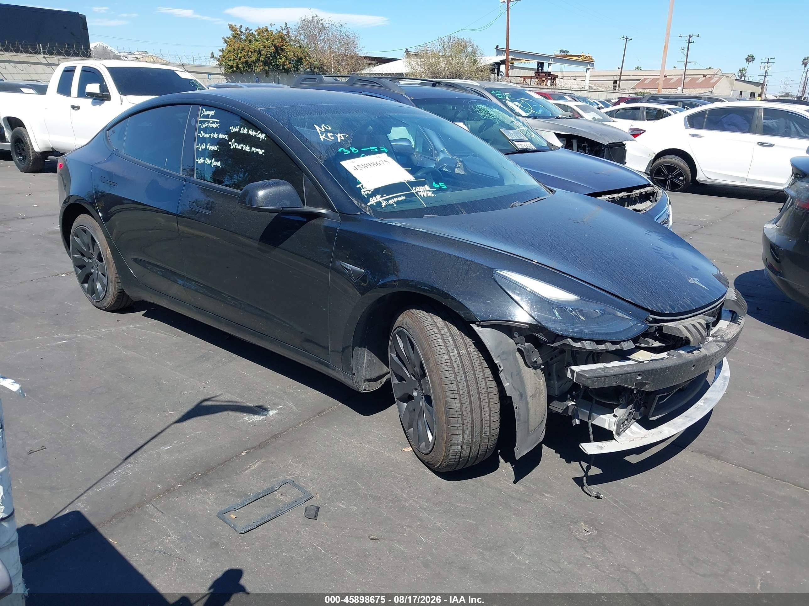 2021 Tesla Model 3 VIN 5YJ3E1EB7MF002429 — IAAI salvage auction photo