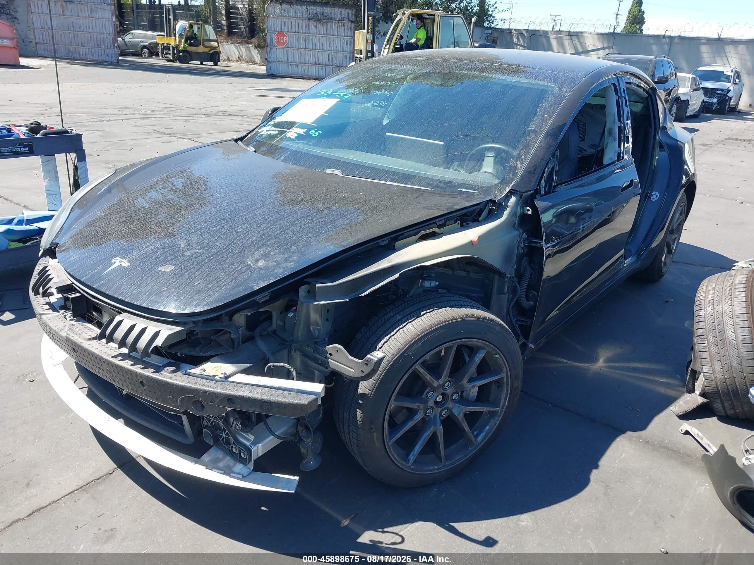 2021 Tesla Model 3 VIN 5YJ3E1EB7MF002429 IAAI salvage auction — Side, Salvage Certificate (California), sold $7,600 on 2026-09-19 (photo 2)