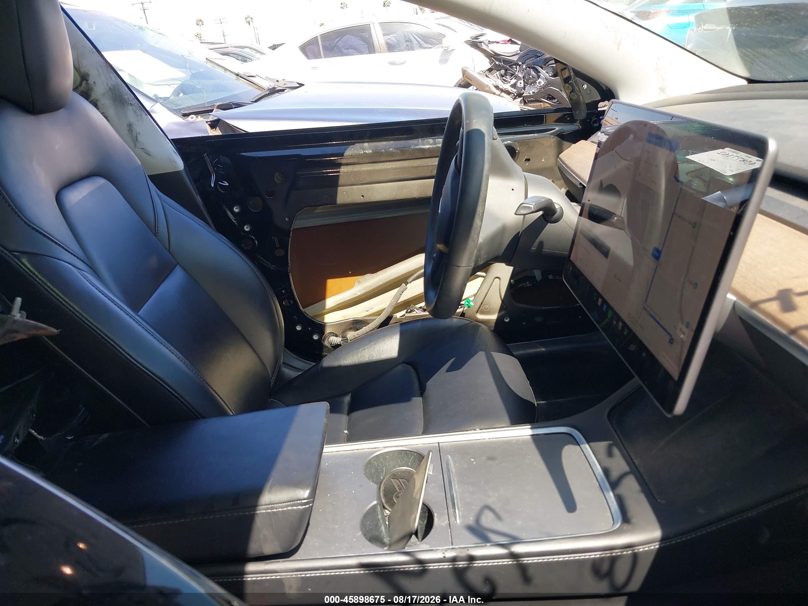 2021 Tesla Model 3 VIN 5YJ3E1EB7MF002429 IAAI salvage auction — Side, Salvage Certificate (California), sold $7,600 on 2026-09-19 (photo 5)