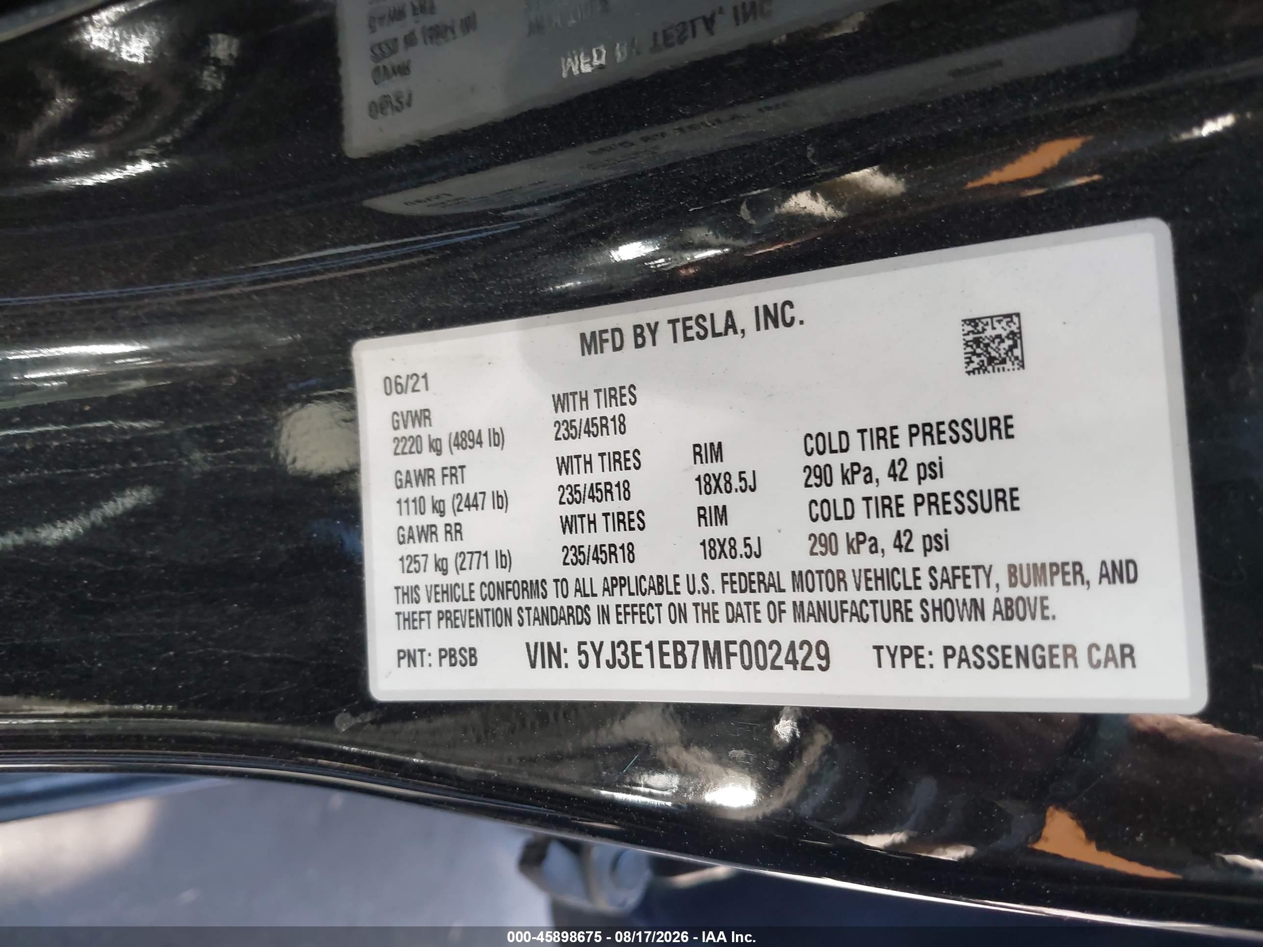 2021 Tesla Model 3 VIN 5YJ3E1EB7MF002429 IAAI salvage auction — Side, Salvage Certificate (California), sold $7,600 on 2026-09-19 (photo 9)