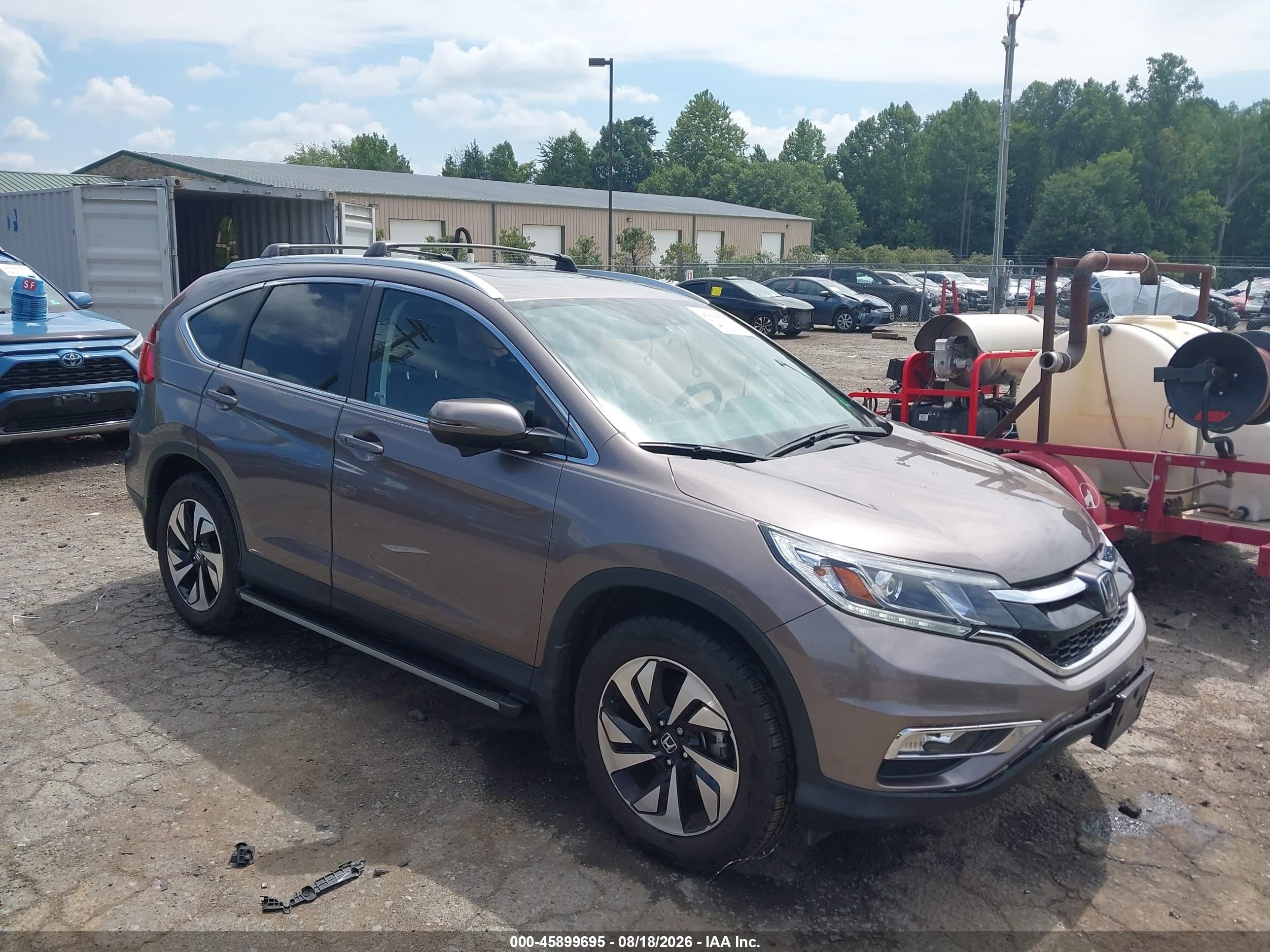 2015 Honda CR-V VIN 5J6RM4H92FL077038 — IAAI salvage auction photo