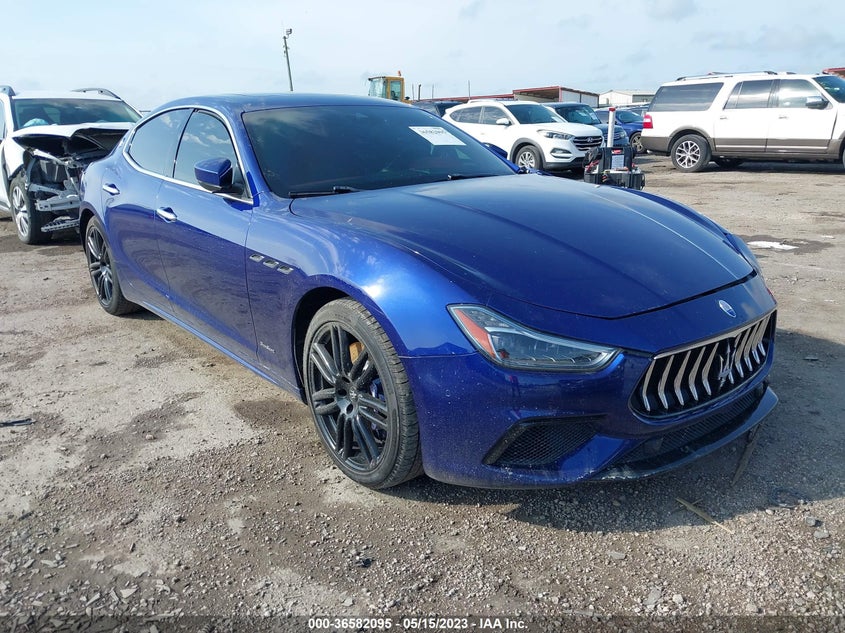 2018 Maserati Ghibli VIN ZAM57YTS8J1290914 IAAI salvage auction — LEFT SIDE, Original (Texas), sold $9,850 on 2026-07-28 (photo 1)