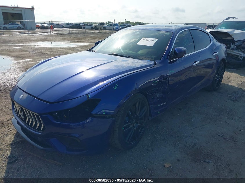 2018 Maserati Ghibli VIN ZAM57YTS8J1290914 IAAI salvage auction — LEFT SIDE, Original (Texas), sold $9,850 on 2026-07-28 (photo 2)