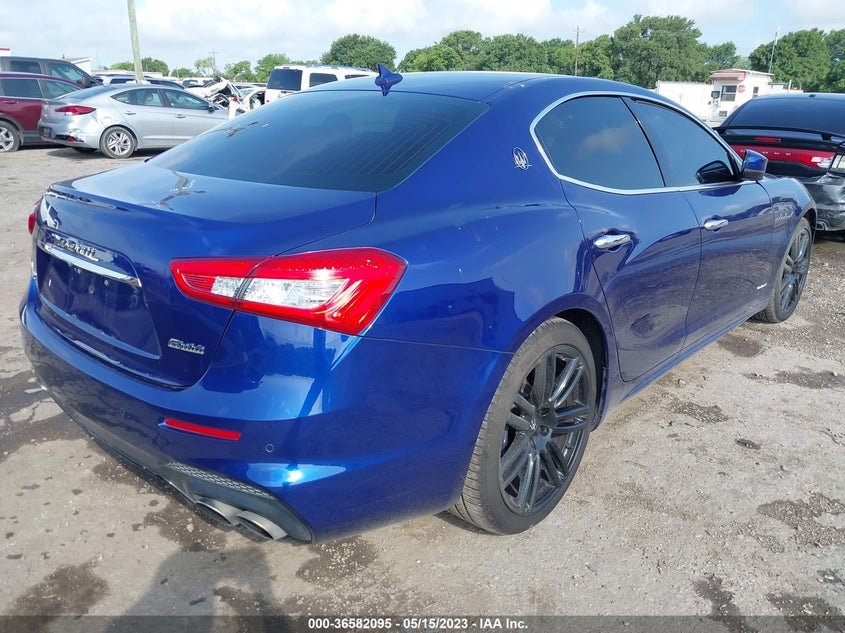 2018 Maserati Ghibli VIN ZAM57YTS8J1290914 IAAI salvage auction — LEFT SIDE, Original (Texas), sold $9,850 on 2026-07-28 (photo 4)