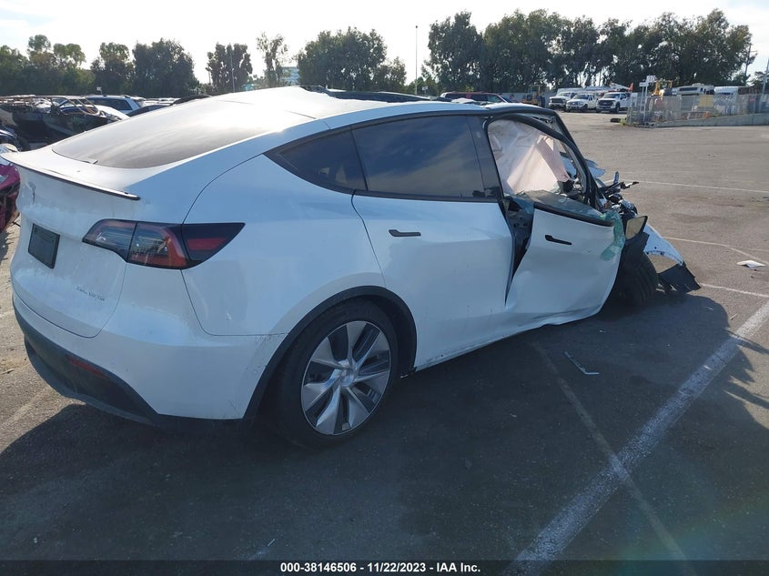 2022 Tesla Model y VIN 7SAYGDEE3NF554851 IAAI salvage auction — ALL OVER, Non-Repairable (California), sold $2,750 on 2026-07-09 (photo 4)