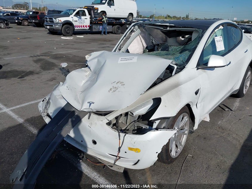 2022 Tesla Model y VIN 7SAYGDEE3NF554851 IAAI salvage auction — ALL OVER, Non-Repairable (California), sold $2,750 on 2026-07-09 (photo 6)