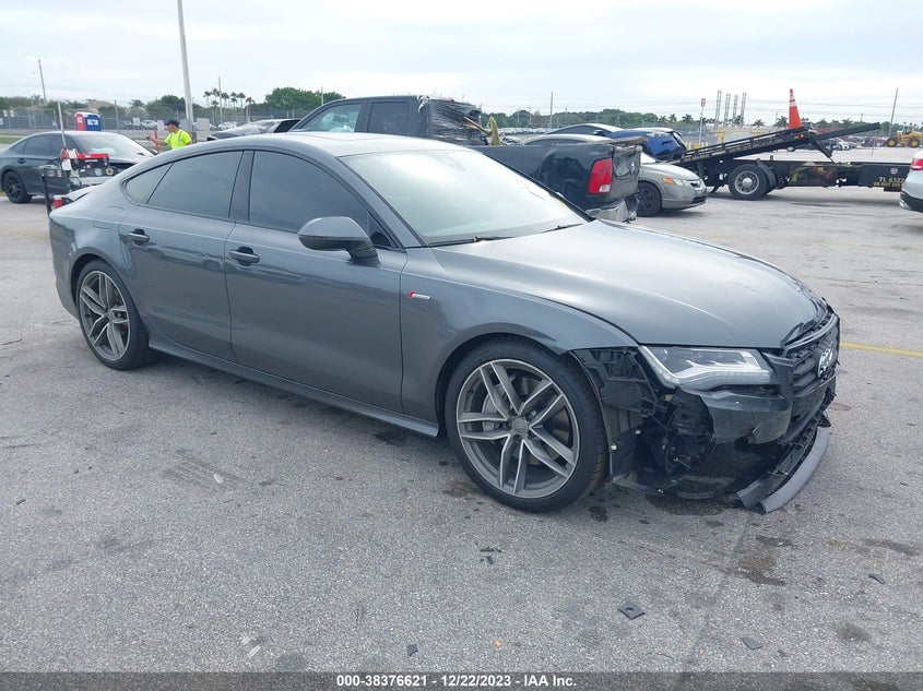 2015 Audi A7 VIN WAU2GAFC4FN062571 IAAI salvage auction — FRONT END, Rebuildable (Florida), sold $4,900 on 2026-09-02 (photo 1)