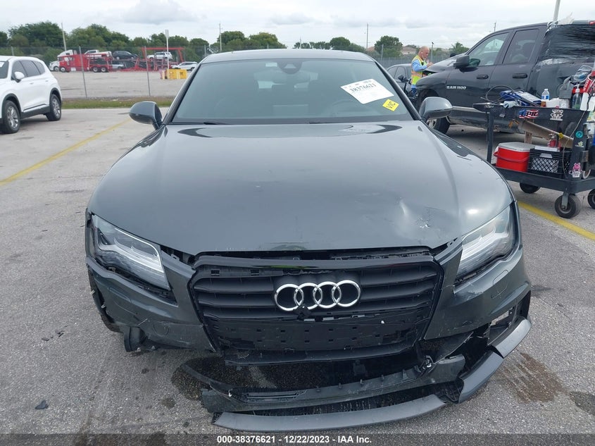 2015 Audi A7 VIN WAU2GAFC4FN062571 IAAI salvage auction — FRONT END, Rebuildable (Florida), sold $4,900 on 2026-09-02 (photo 6)