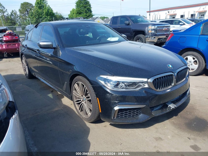 2019 BMW M550i xDrive VIN WBAJB9C57KB464465 COPART salvage auction — Front End, Salvage (North Carolina), sold $20,125 on 2024-07-15 (photo 1)