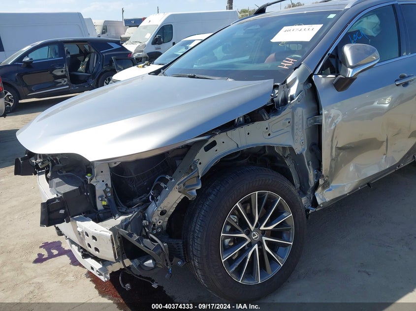 2024 Lexus Nx 350h VIN 2T2GKCEZ3RC020467 IAAI salvage auction — LEFT FRONT, Salvage (California), sold $16,400 on 2026-08-12 (photo 6)