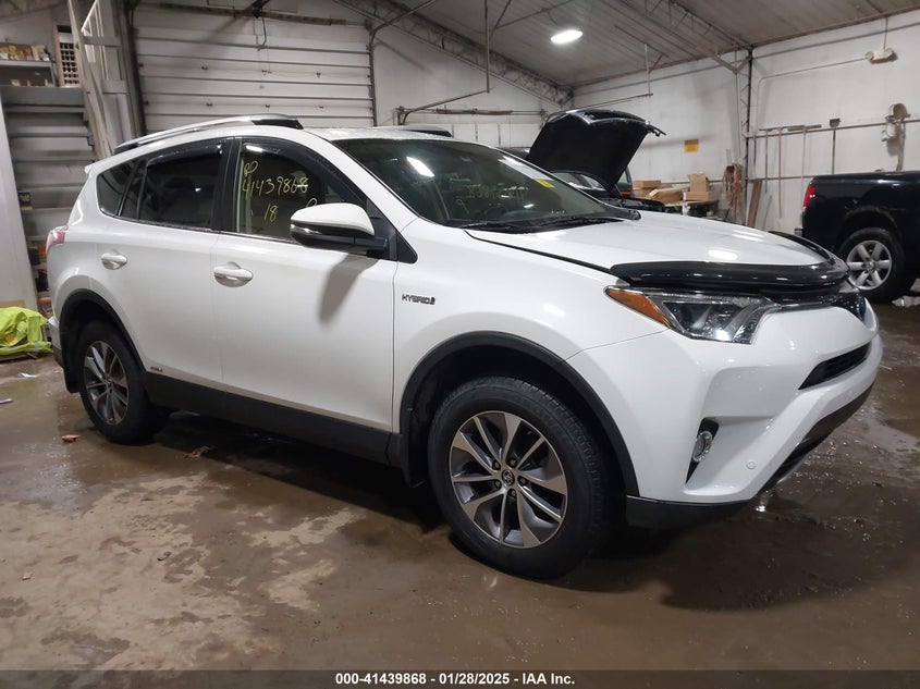 2018 TOYOTA RAV4 HV VIN JTMRJREV3JD238352 — COPART salvage auction photo