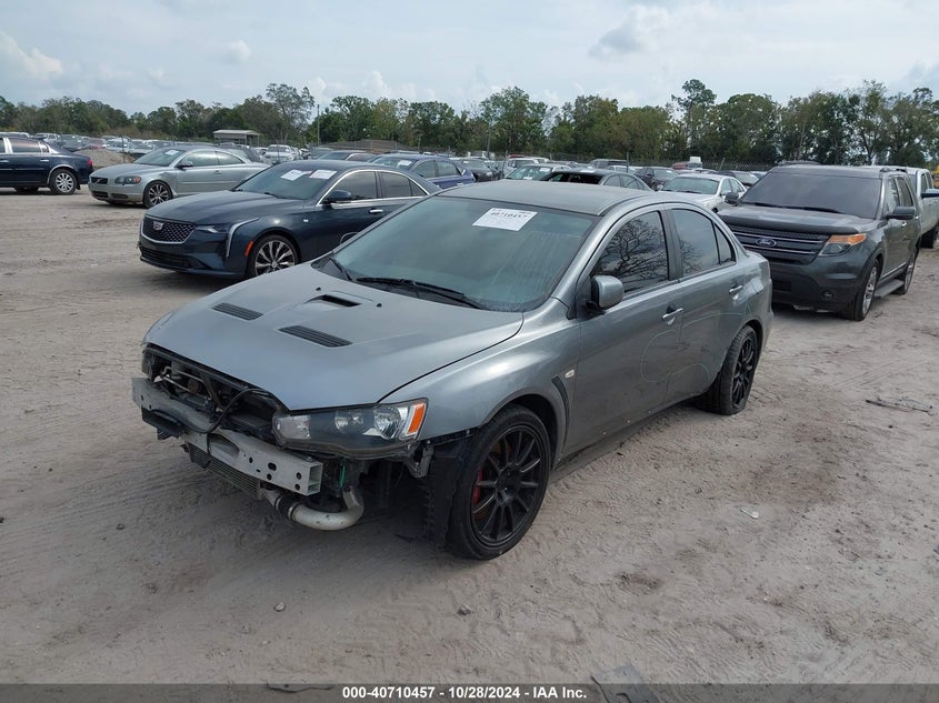 2012 Mitsubishi Lancer evolution VIN JA32W8FV7CU010819 COPART salvage auction — Front & Rear, Clear (Florida), sold $7,100 on 2024-12-04 (photo 2)