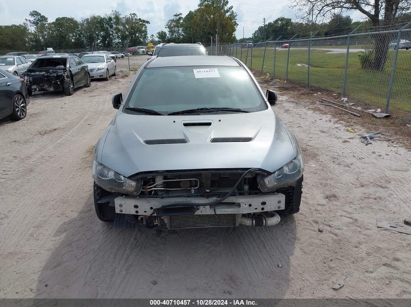 2012 Mitsubishi Lancer evolution VIN JA32W8FV7CU010819 COPART salvage auction — Front & Rear, Clear (Florida), sold $7,100 on 2024-12-04 (photo 6)