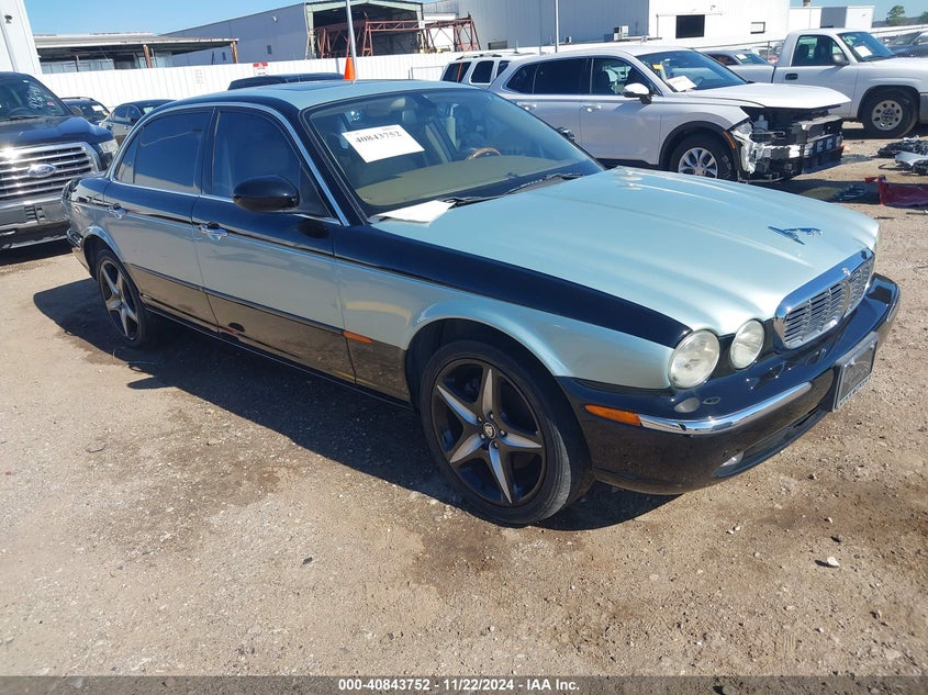 2005 Jaguar Xj series VIN SAJWA79C85SG43791 IAAI salvage auction — LEFT SIDE, Salvage (Texas), sold $1,000 on 2026-07-09 (photo 1)