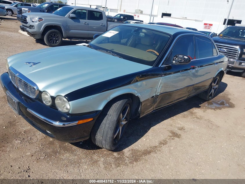2005 Jaguar Xj series VIN SAJWA79C85SG43791 IAAI salvage auction — LEFT SIDE, Salvage (Texas), sold $1,000 on 2026-07-09 (photo 2)