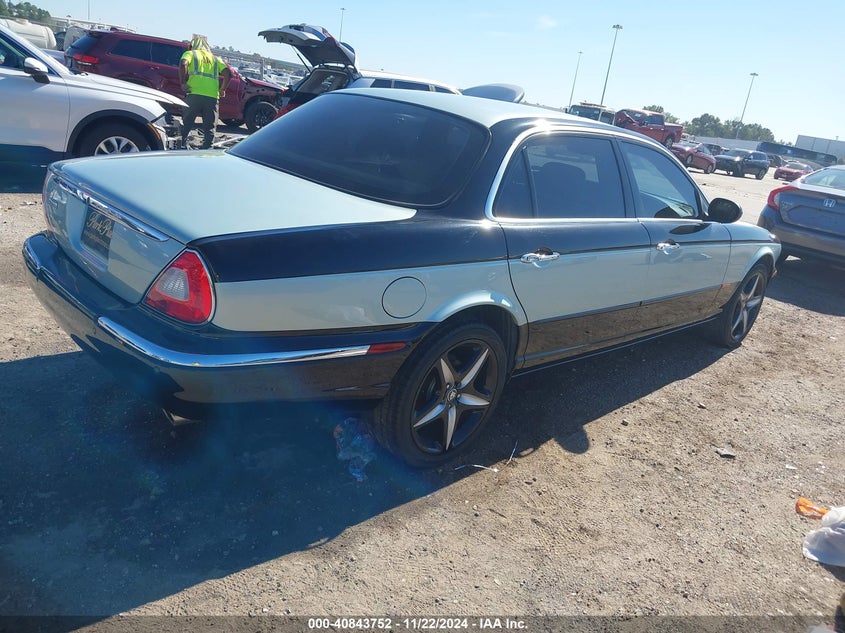 2005 Jaguar Xj series VIN SAJWA79C85SG43791 IAAI salvage auction — LEFT SIDE, Salvage (Texas), sold $1,000 on 2026-07-09 (photo 4)