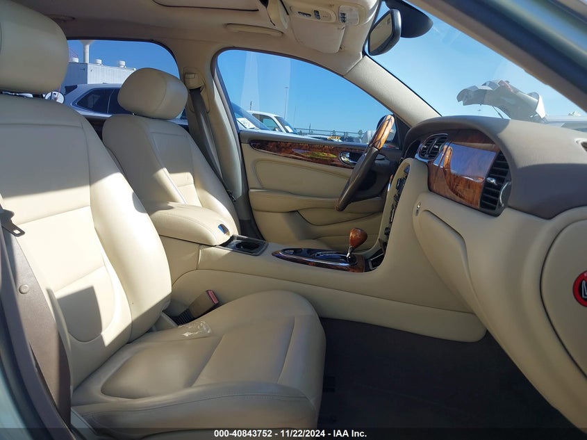 2005 Jaguar Xj series VIN SAJWA79C85SG43791 IAAI salvage auction — LEFT SIDE, Salvage (Texas), sold $1,000 on 2026-07-09 (photo 5)