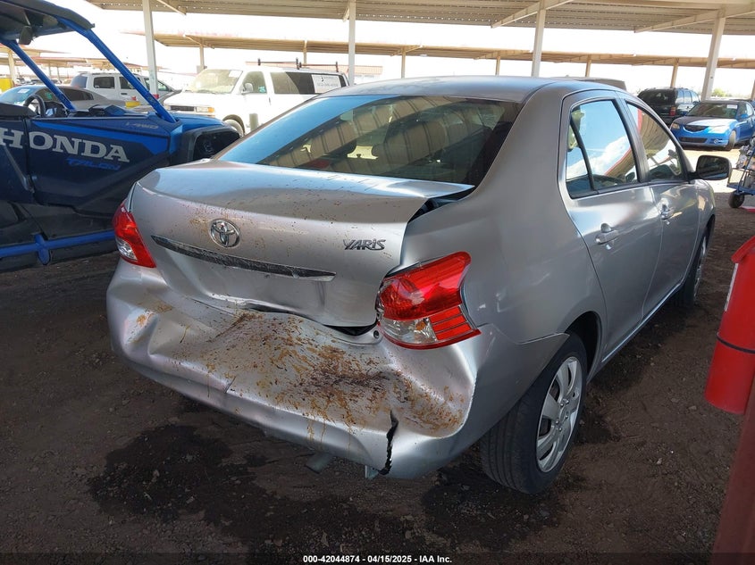 2012 Toyota Yaris VIN JTDBT4K39CL015100 IAAI salvage auction — REAR END, Salvage Title, sold $1,250 on 2026-07-21 (photo 4)